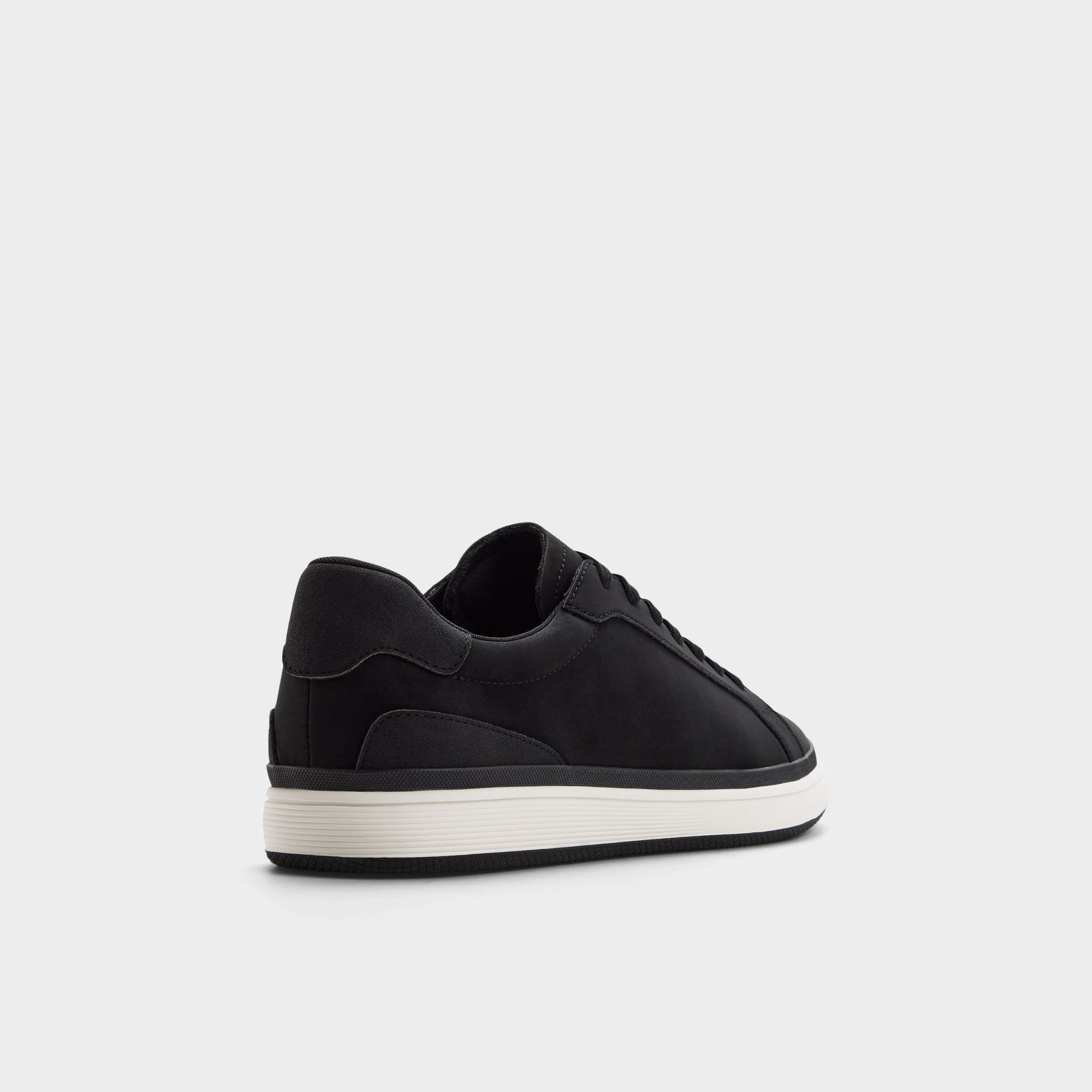 Three-quarter angle of Black Tyrell Low top sneaker's back side