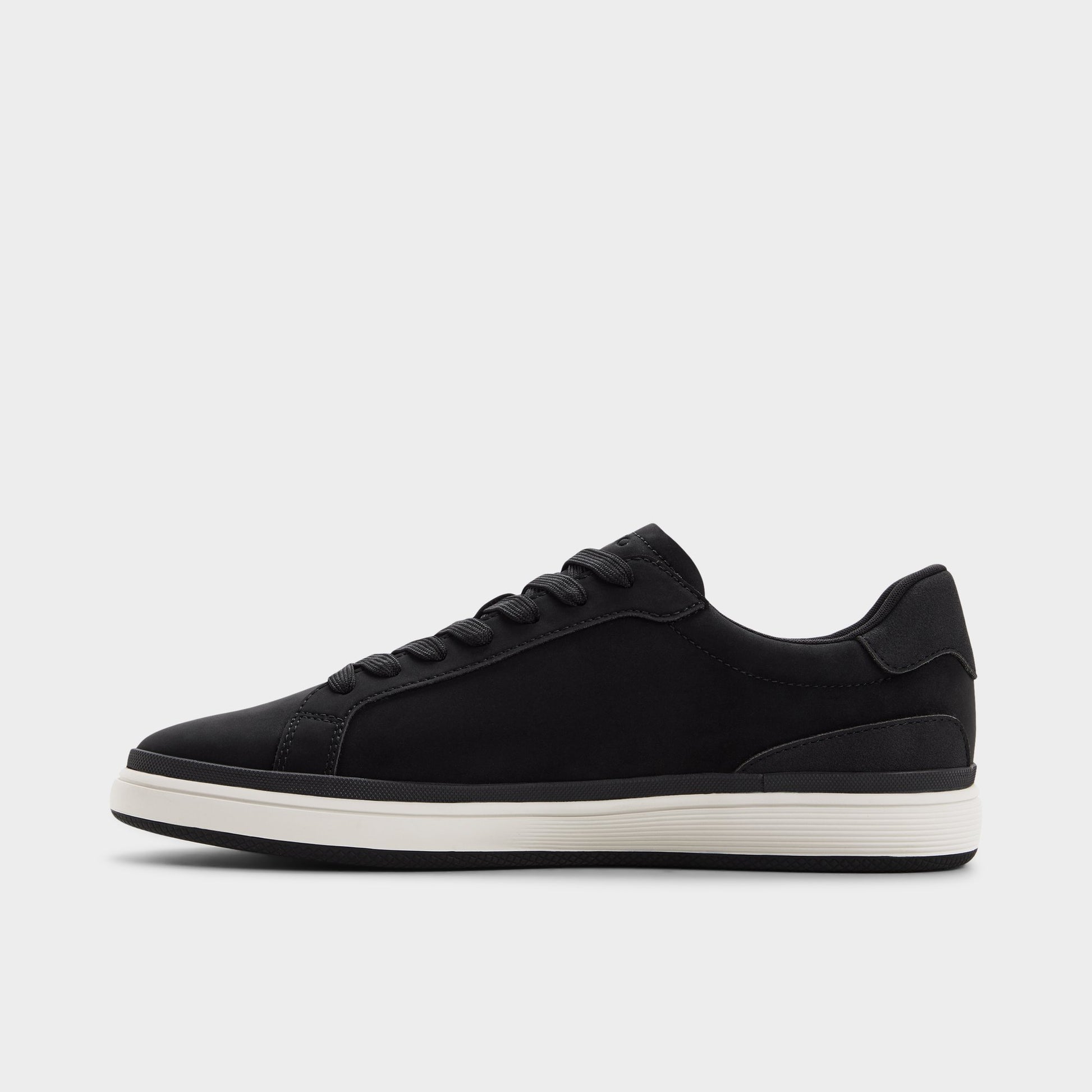 Side view of Black Tyrell Low top sneaker