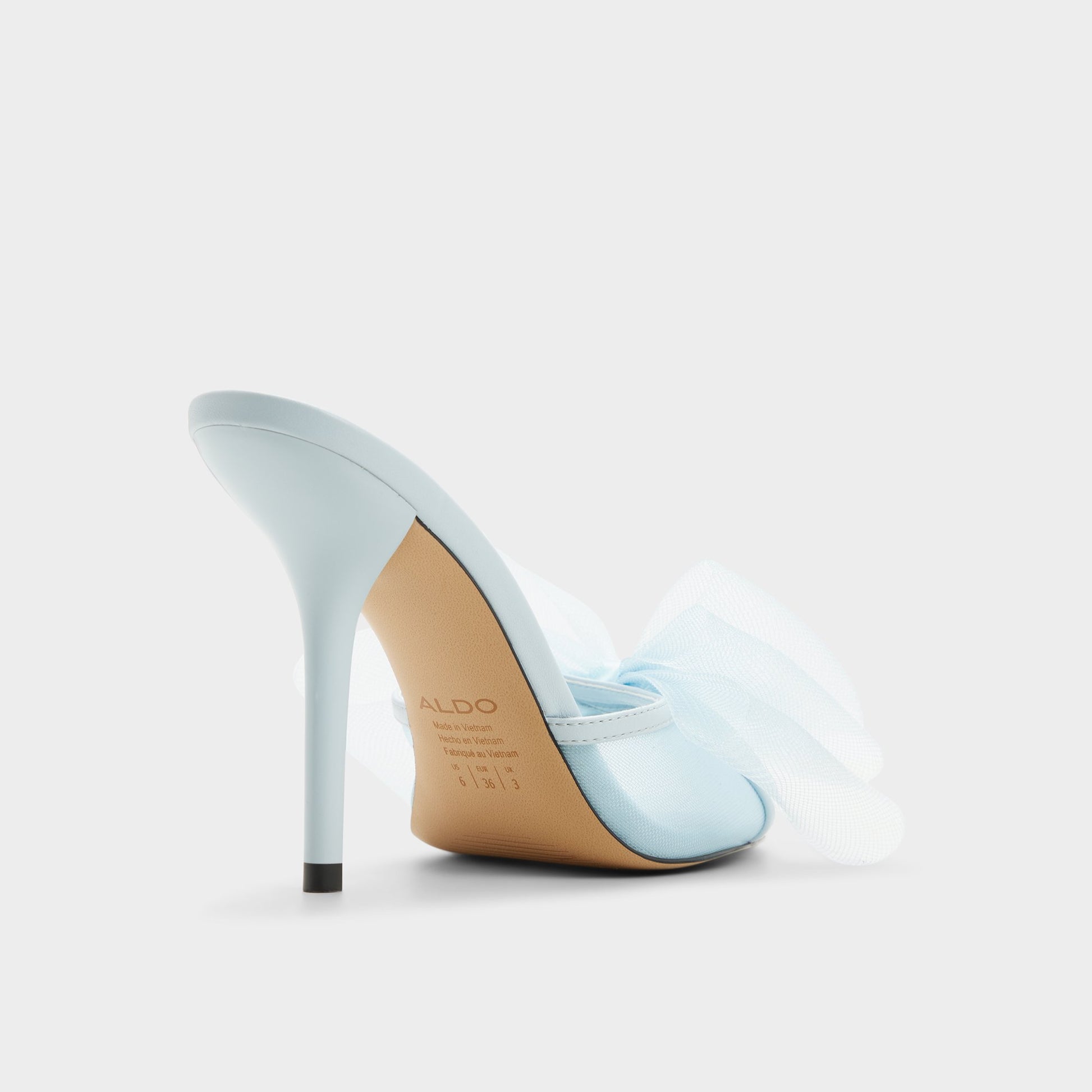 Three-quarter angle of Sky blue Oceanne Heeled mule's back side