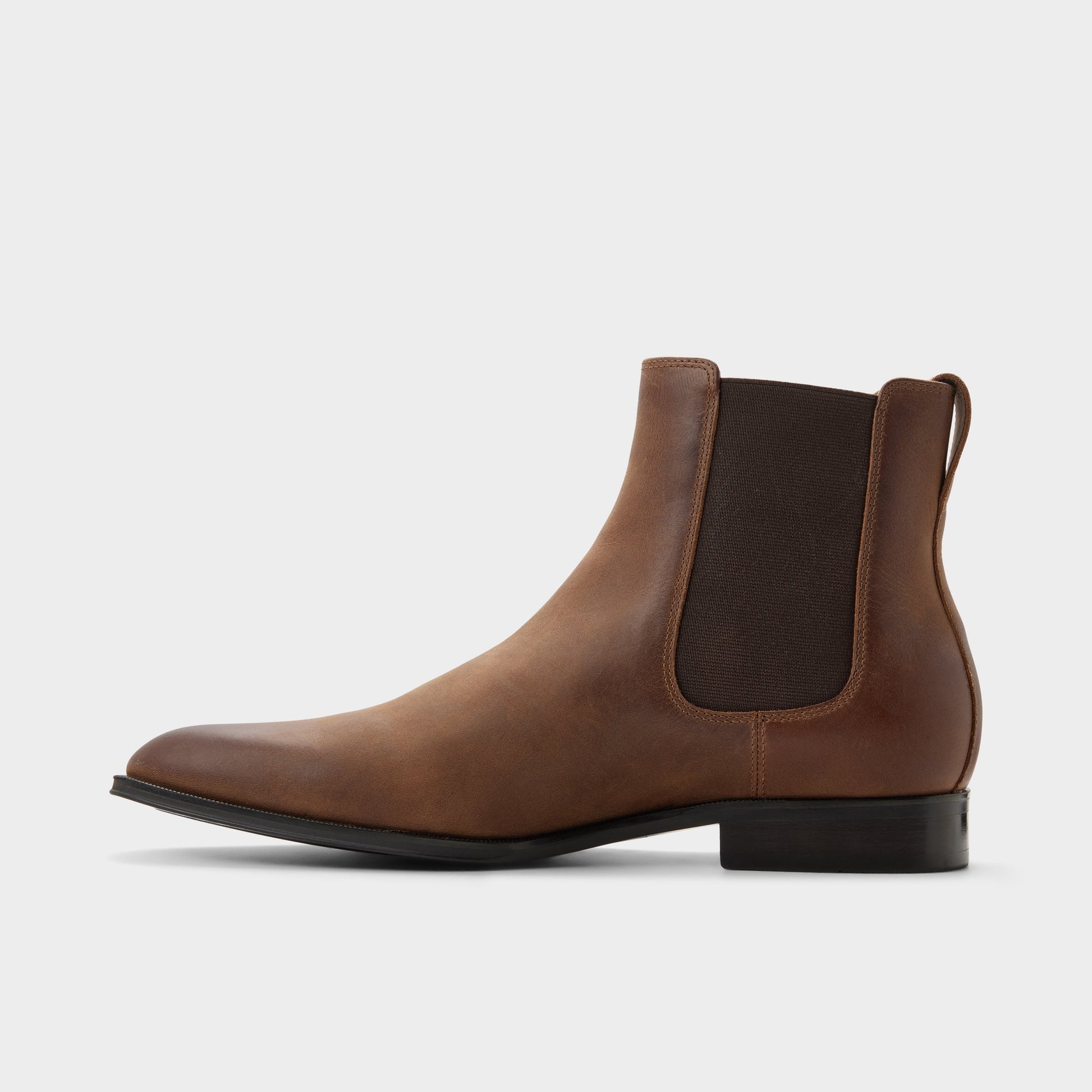 Side view of Cognac Caspen Chelsea boot