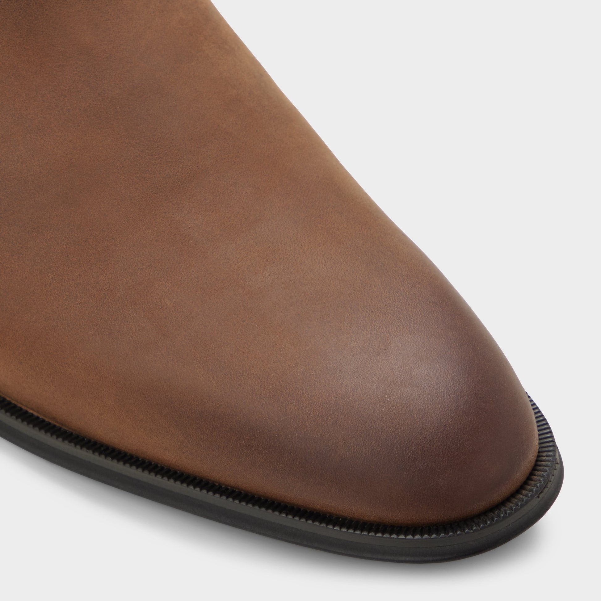 Close-up of the Cognac Caspen Chelsea boot