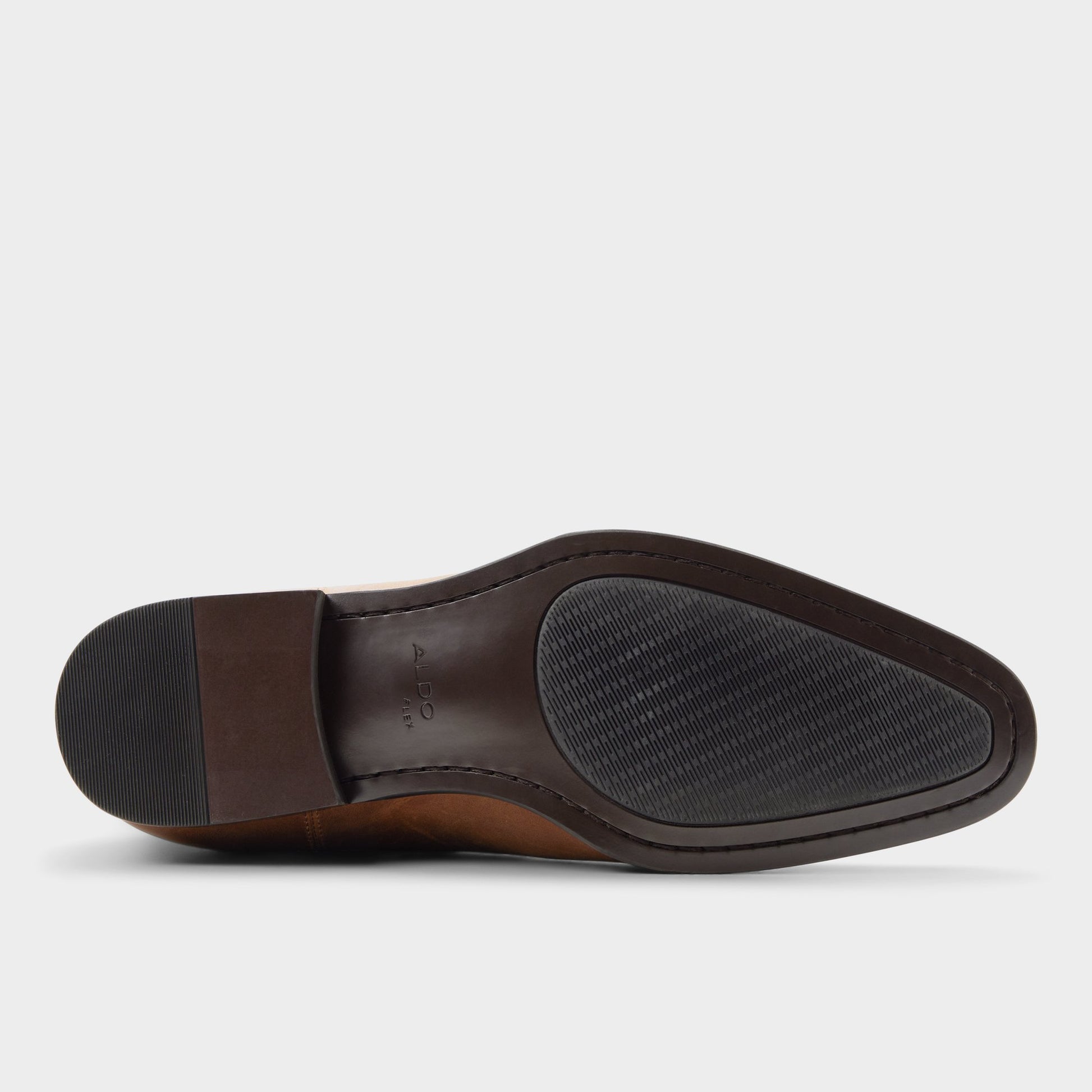 View of Cognac Caspen Chelsea boot's sole
