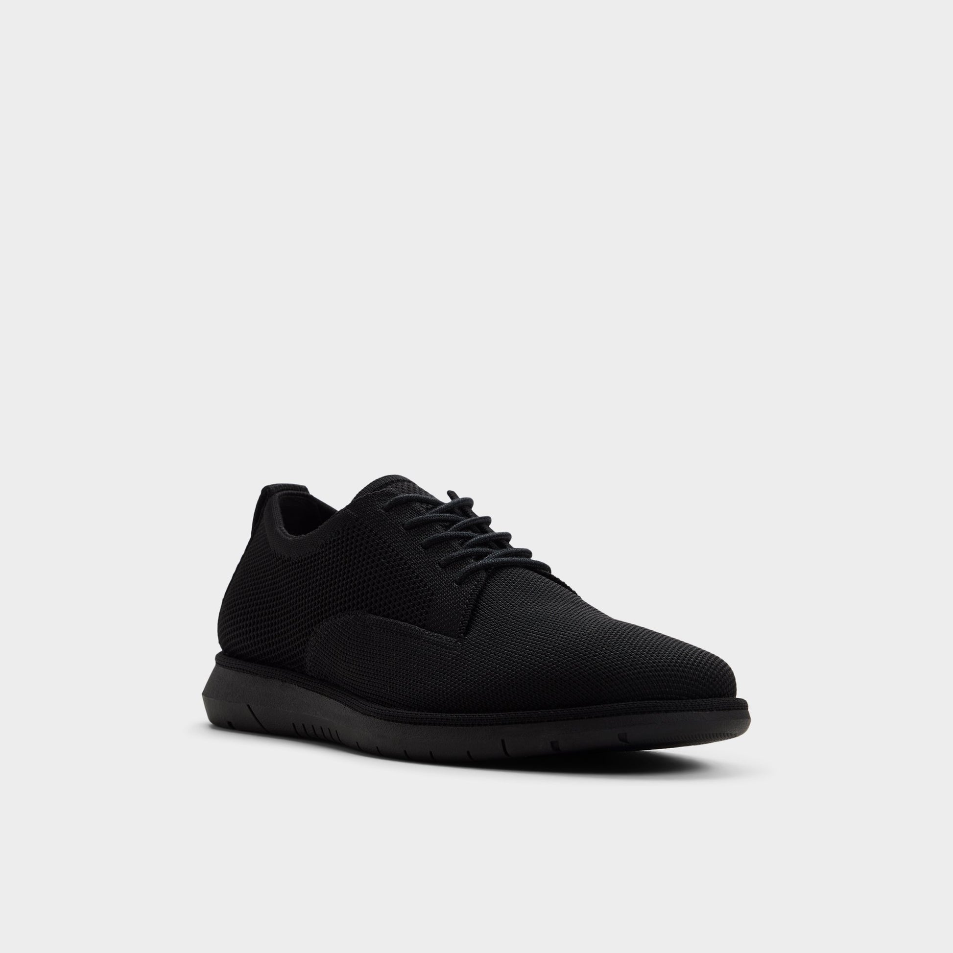 Three-quarter angle of Black Emmitt Oxford shoe's front side
