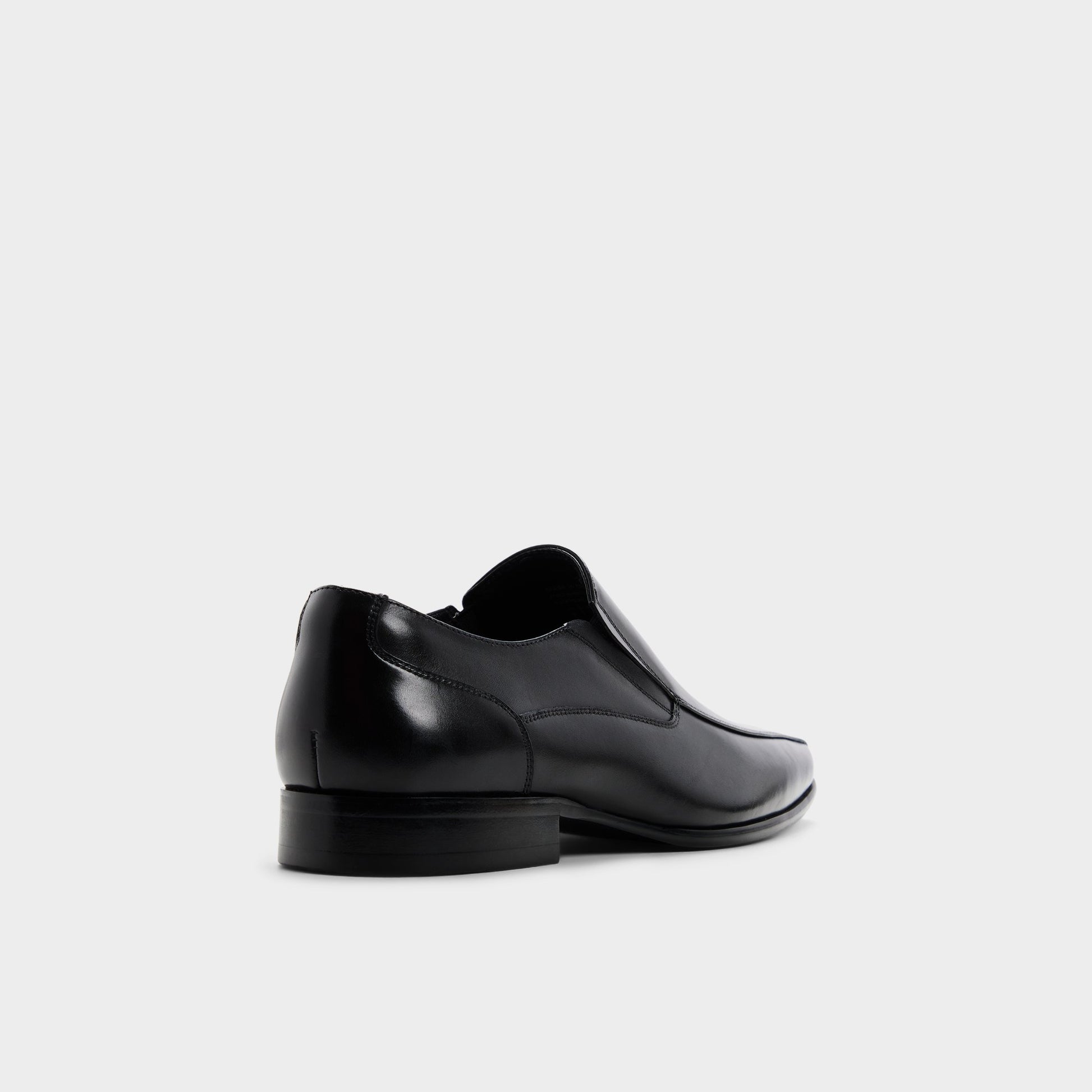 Three-quarter angle of Black Santillo Slip-on's back side
