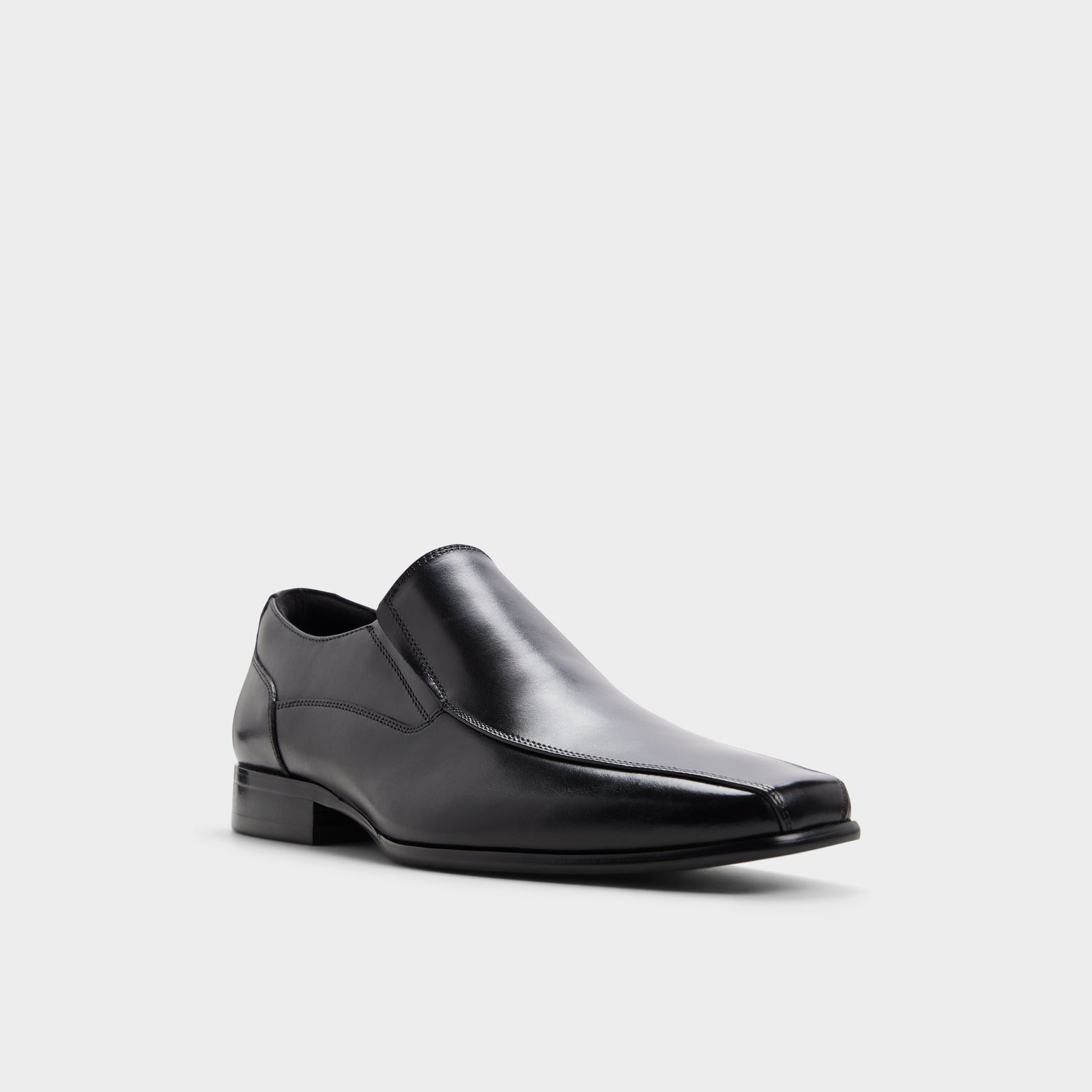 Three-quarter angle of Black Santillo Slip-on's front side