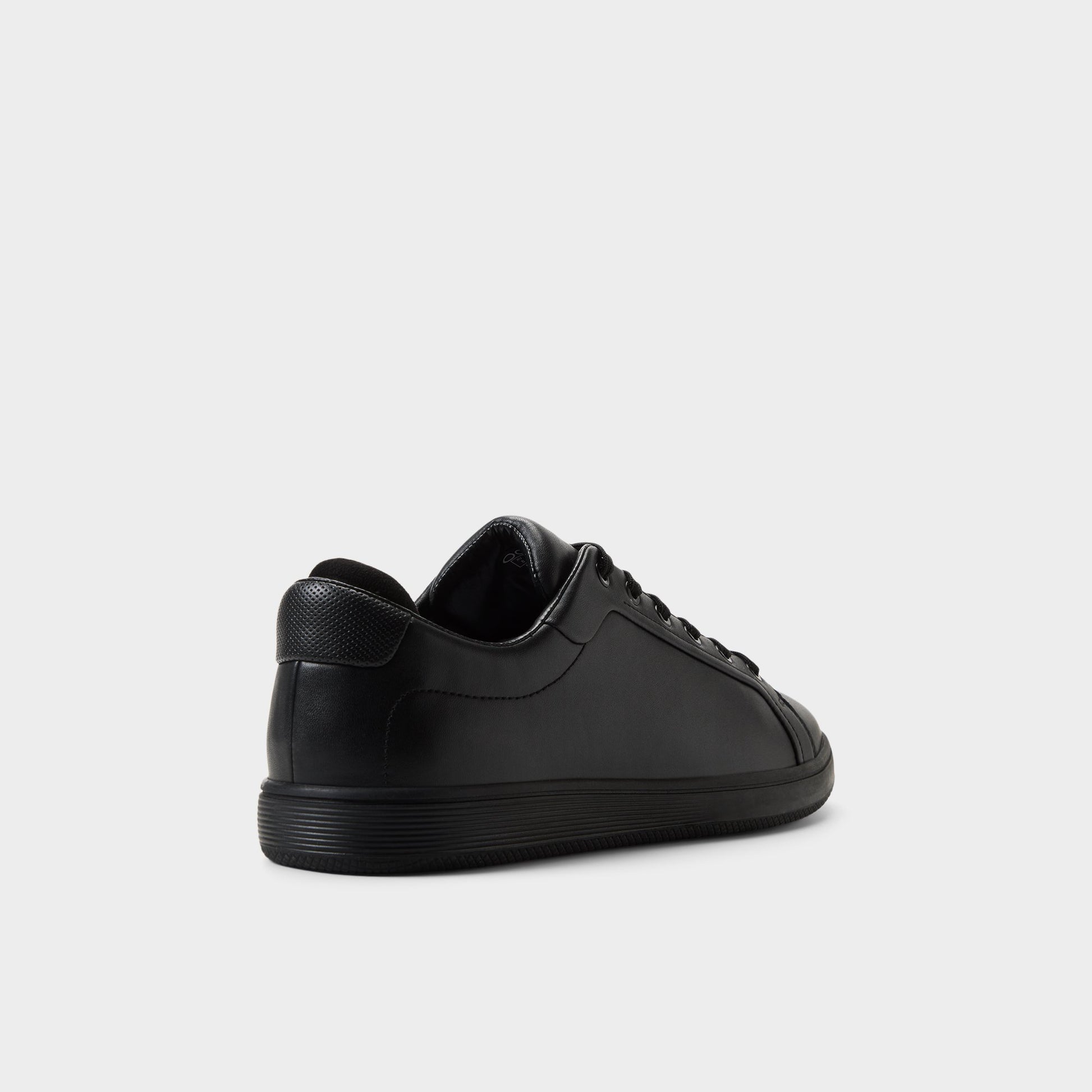 Three-quarter angle of Black/black Kosmo Low top sneaker's back side