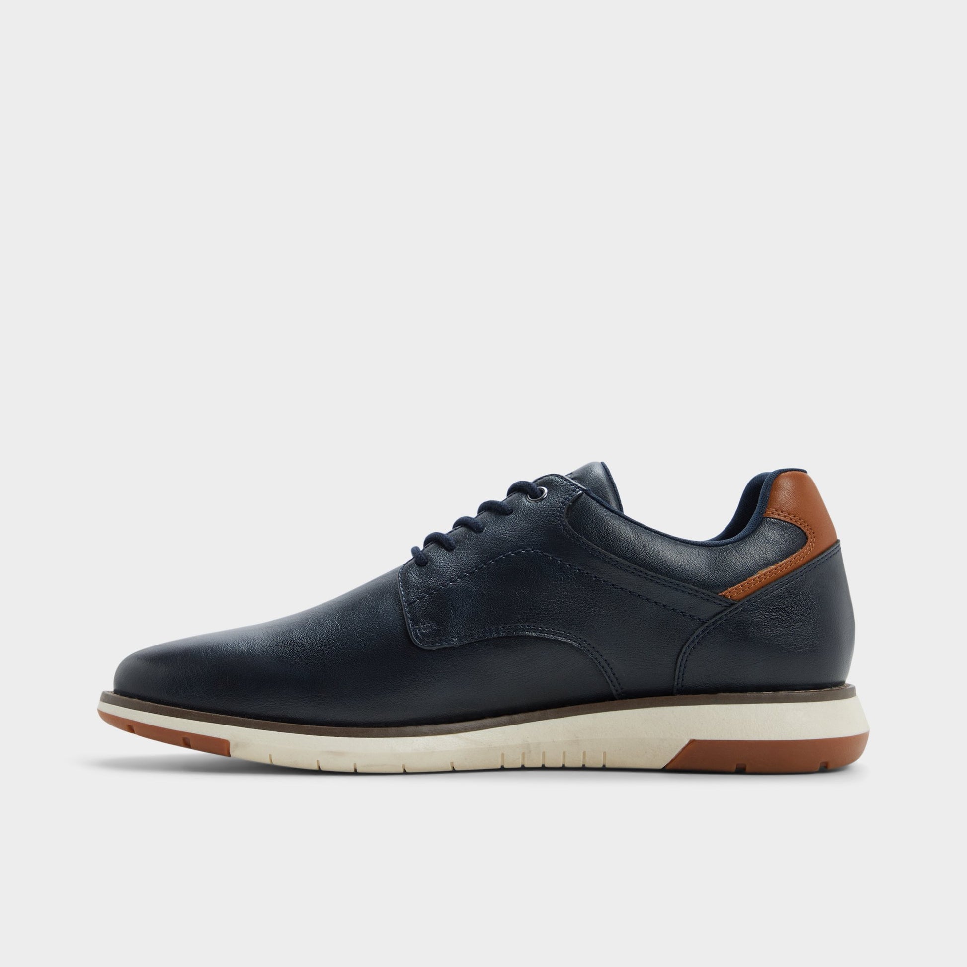 Side view of Navy Kaplan Oxford shoe