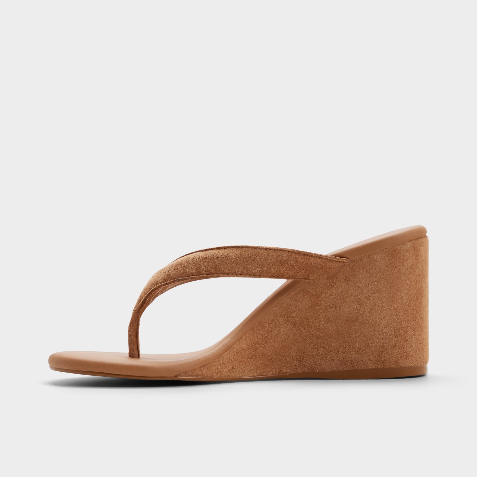 Side view of Medium brown Isabelia Wedge thong sandal