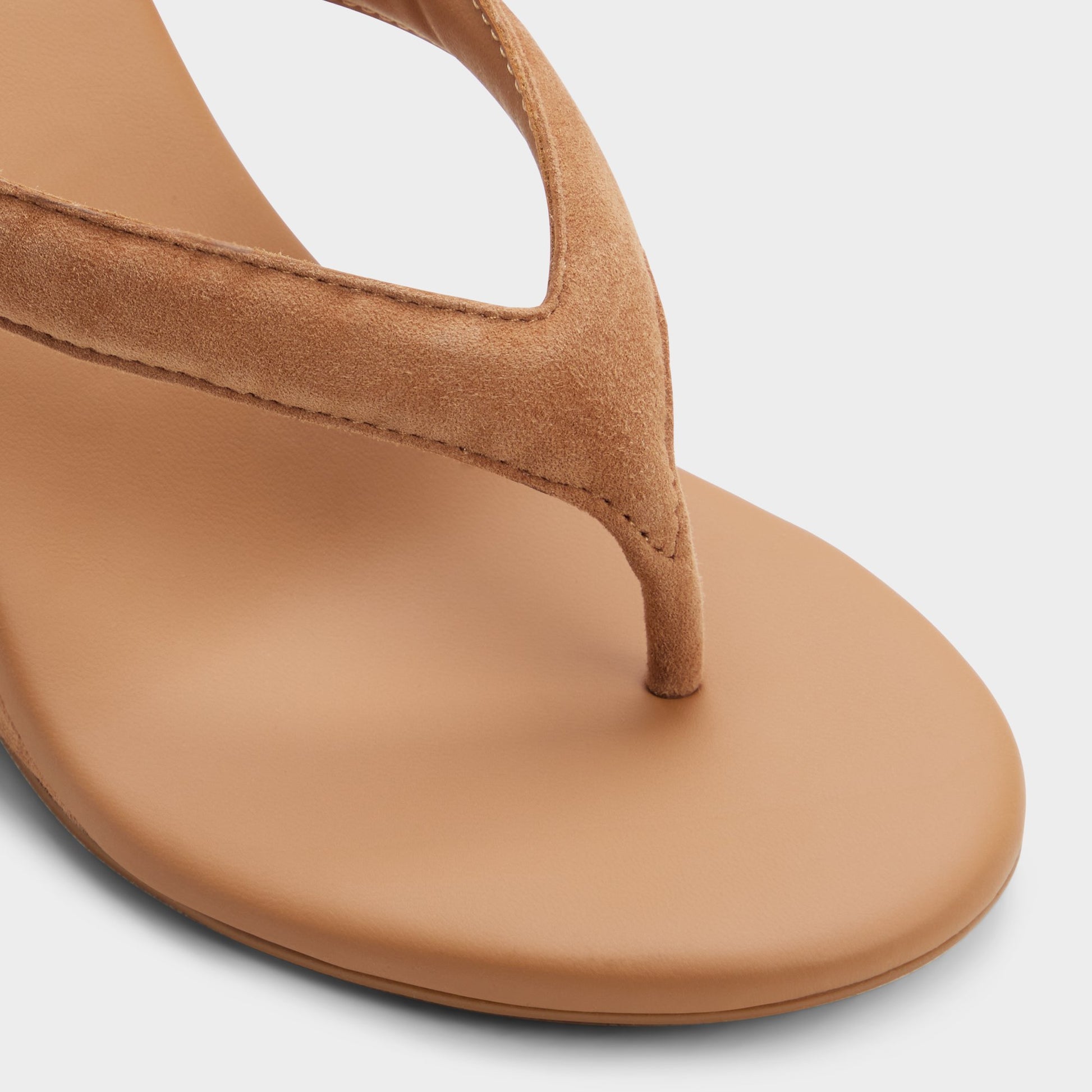 Close-up of the Medium brown Isabelia Wedge thong sandal