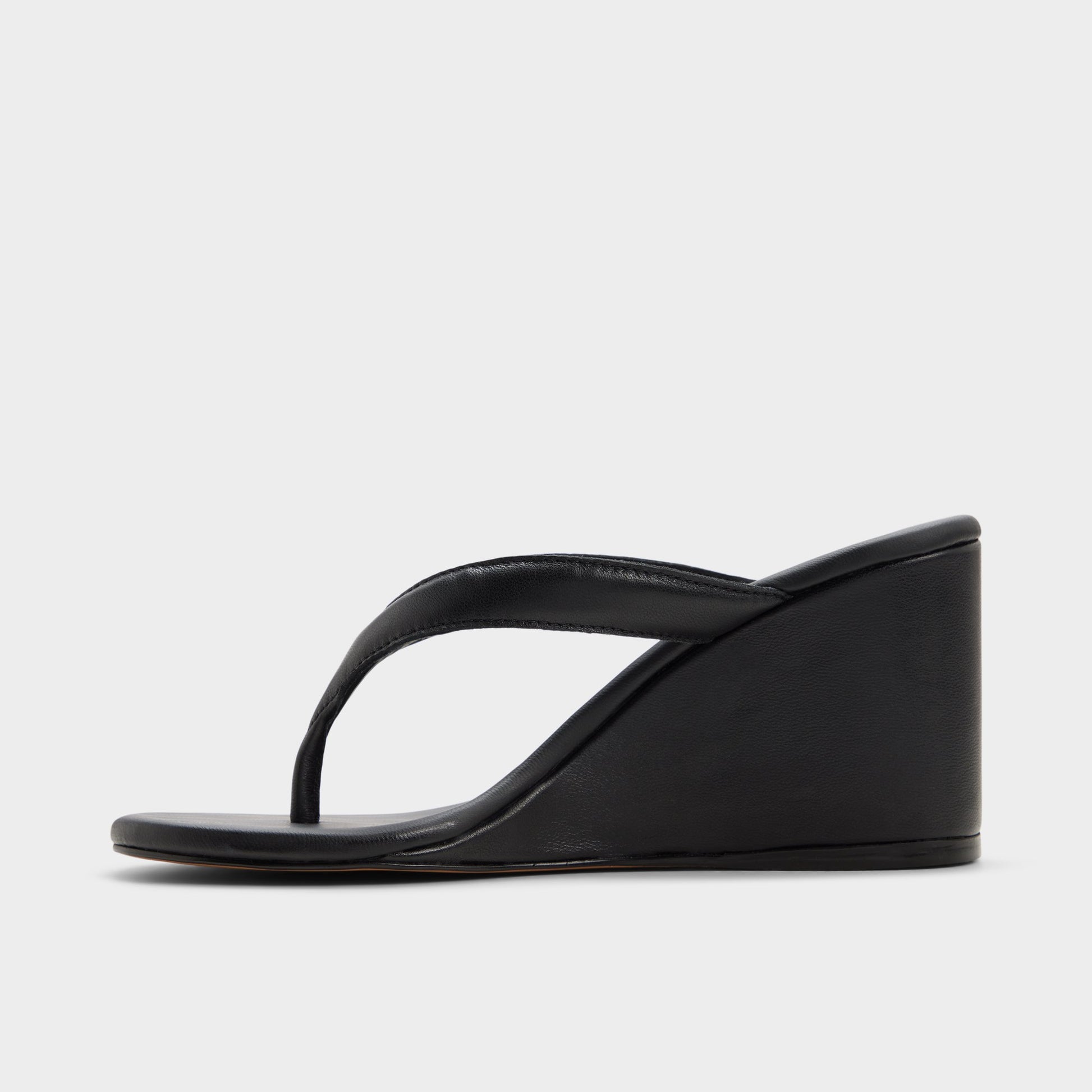 Side view of Black Isabelia Wedge thong sandal
