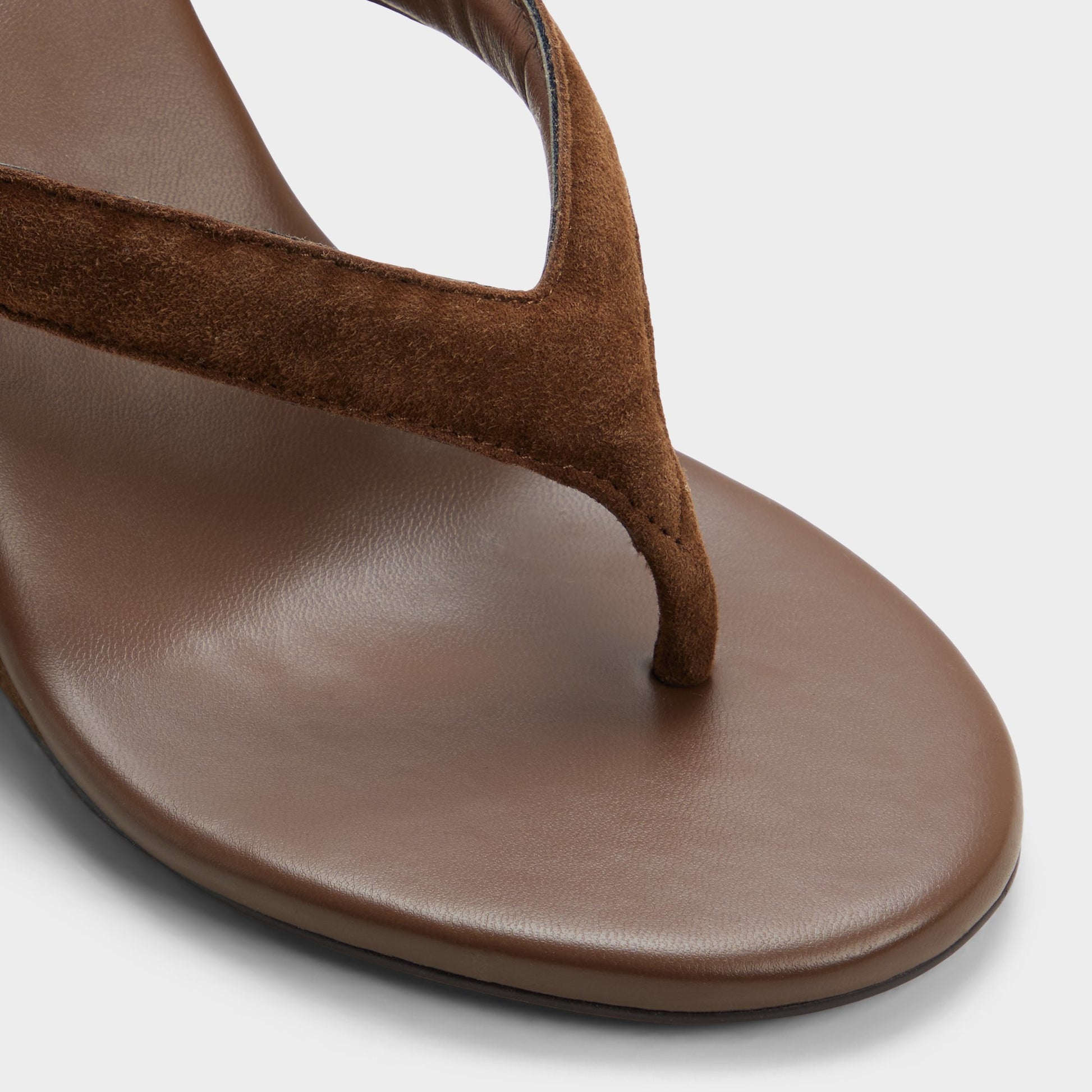 Close-up of the Dark brown Isabelia Wedge thong sandal