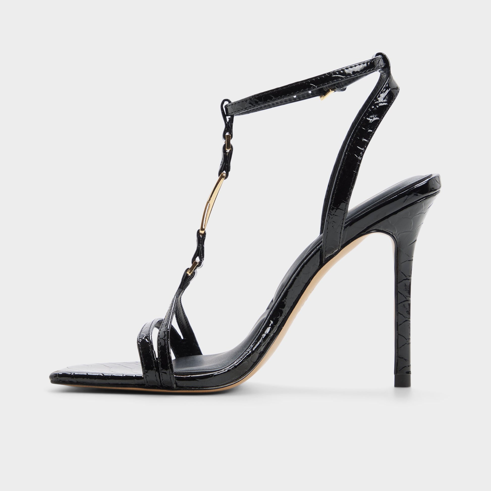 Side view of Black Morly T-strap heeled sandal