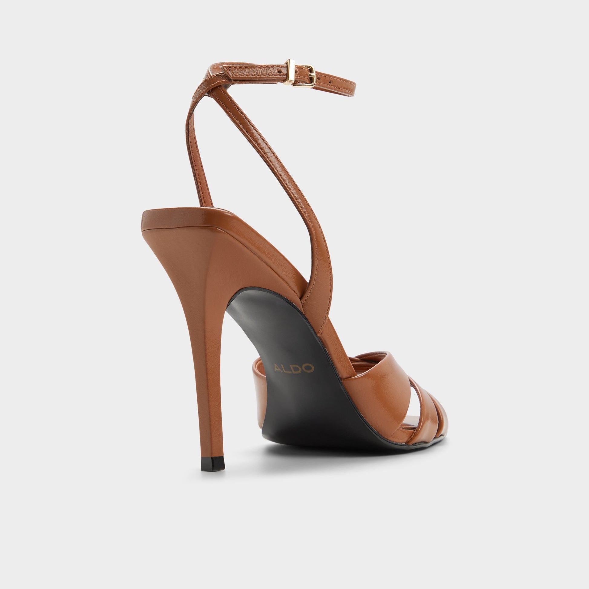 Three-quarter angle of Tan Meteora Strappy heeled sandal's back side