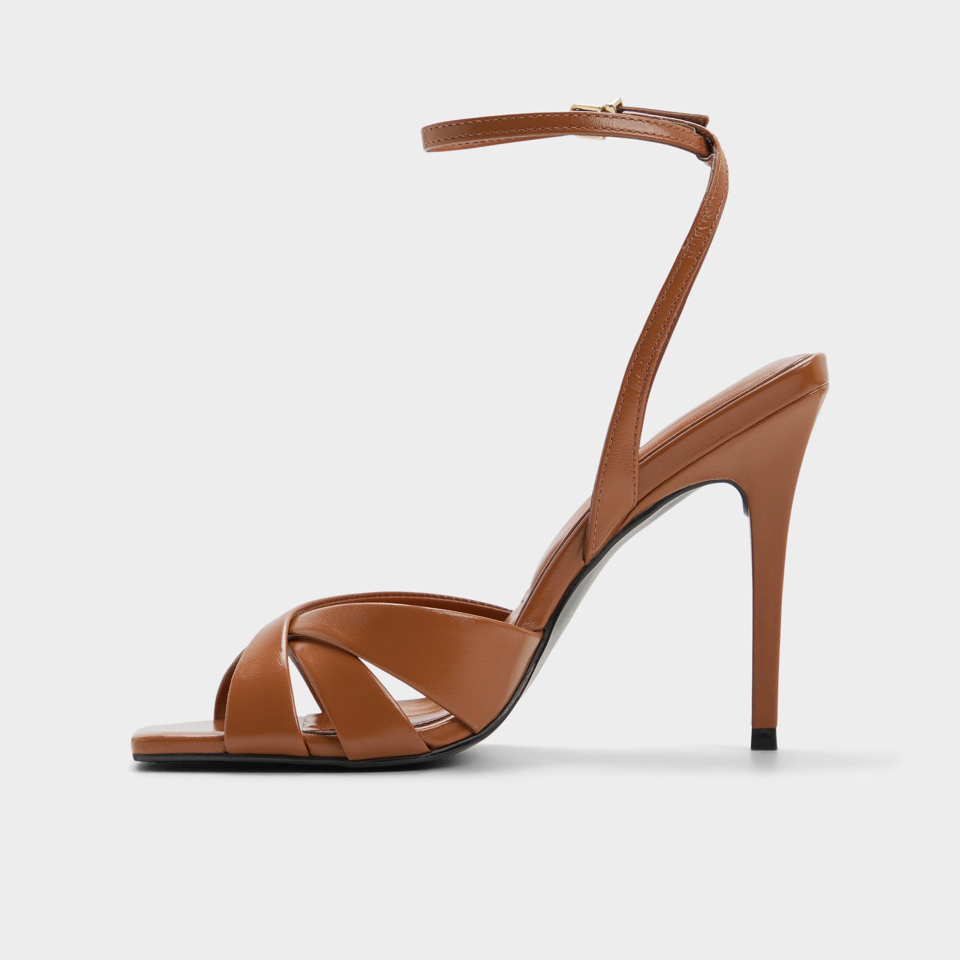 Side view of Tan Meteora Strappy heeled sandal