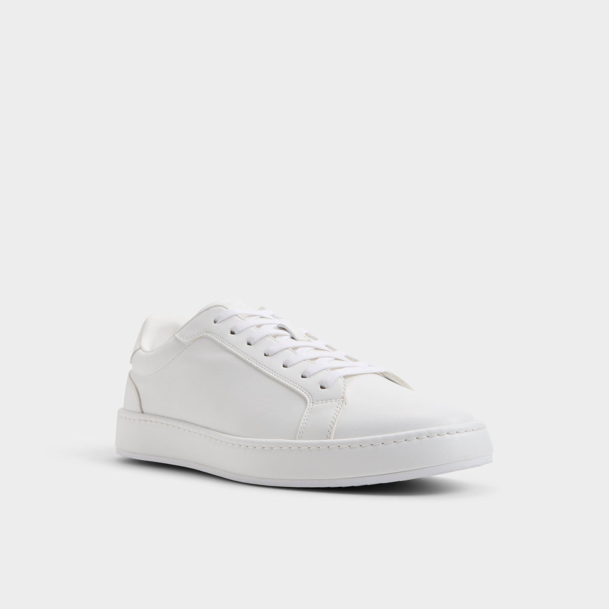 Three-quarter angle of White Joyner Low top sneaker's front side