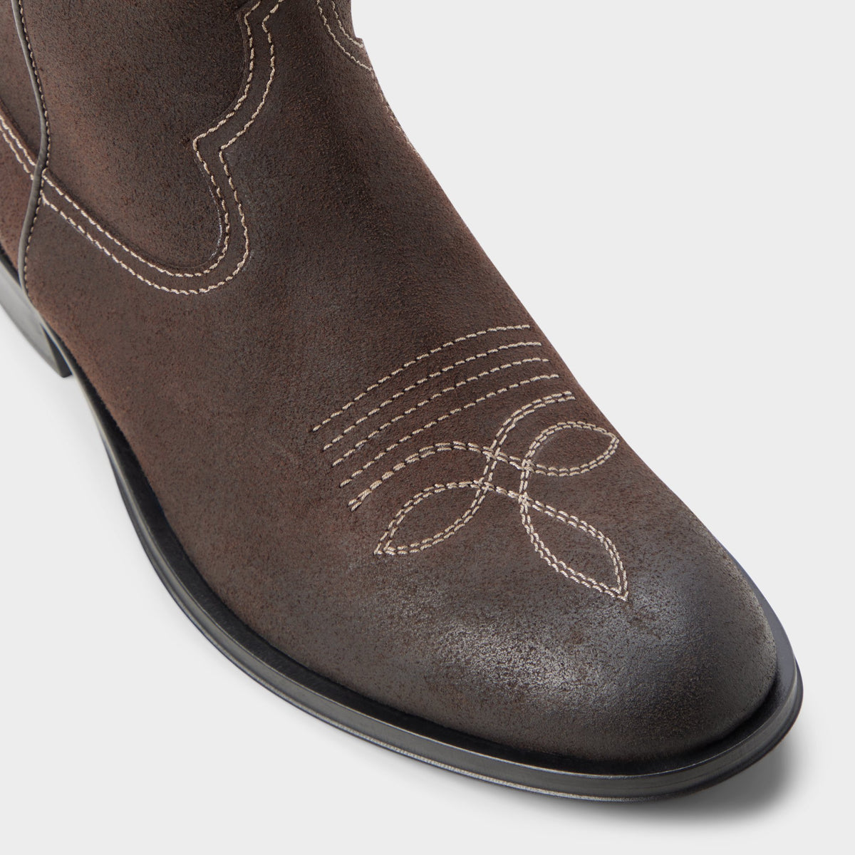 Three-quarter angle of Dark grey Rasmus Western boot's front side