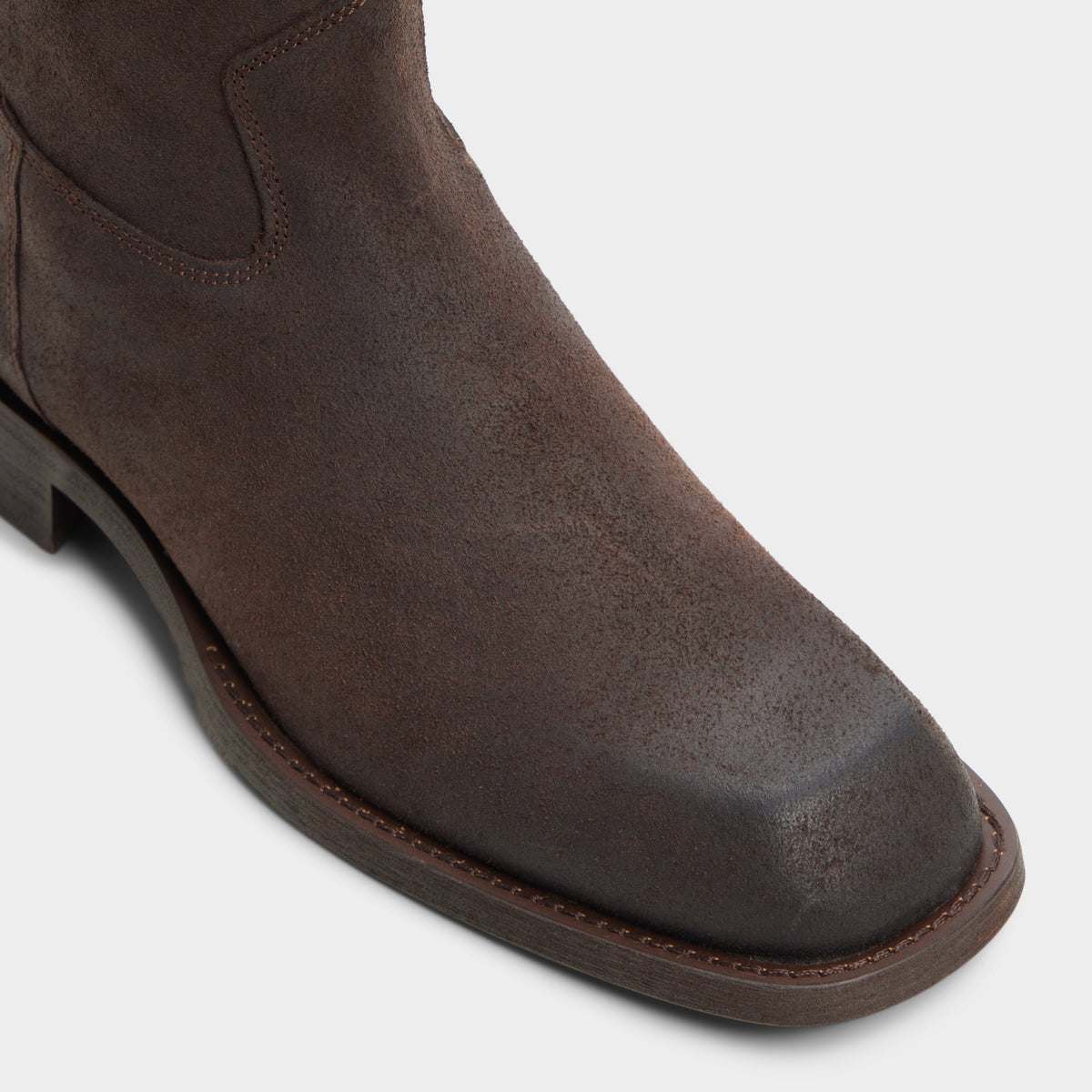 Three-quarter angle of Dark brown Todi Ankle boot's front side