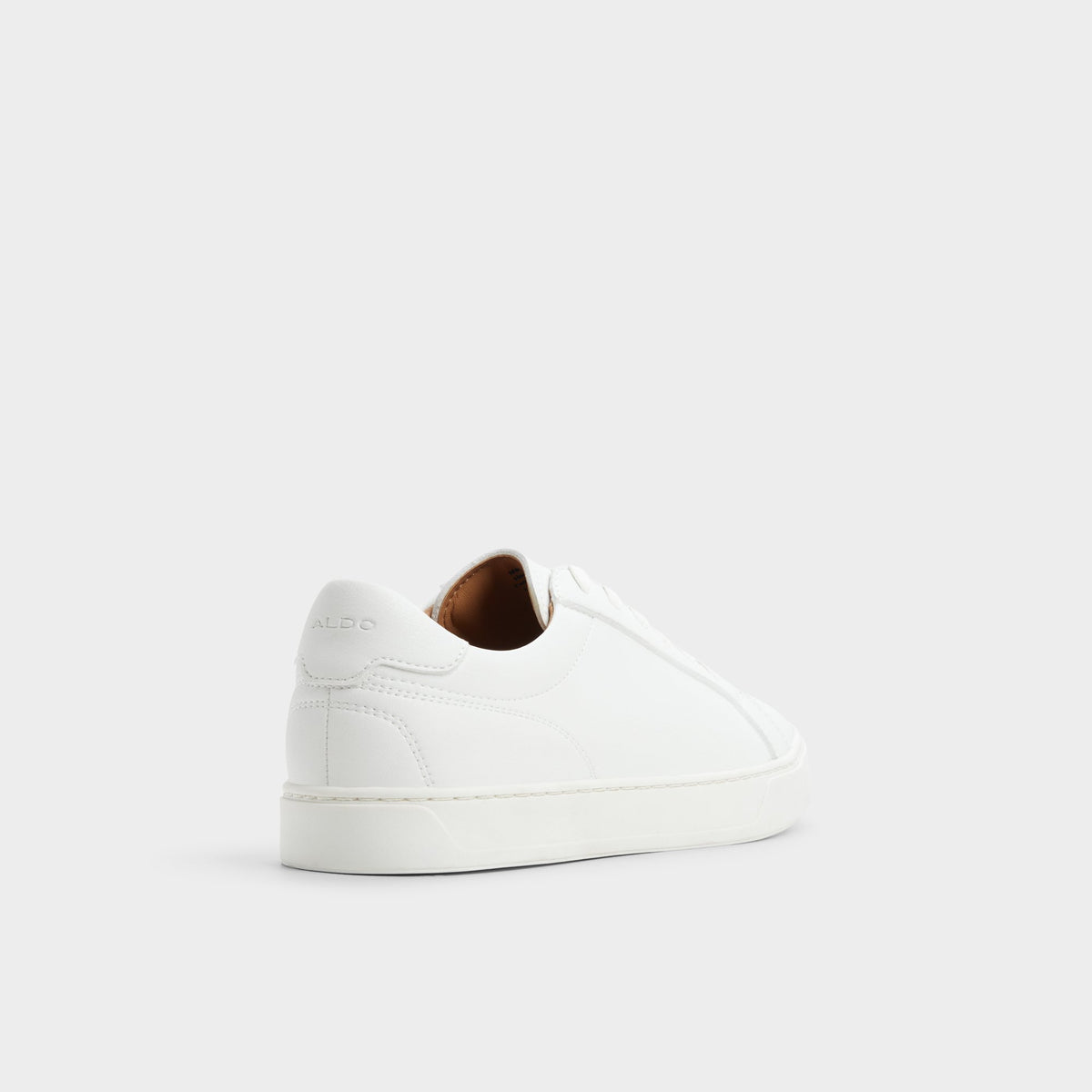 Three-quarter angle of White Fillip Low top sneaker's back side