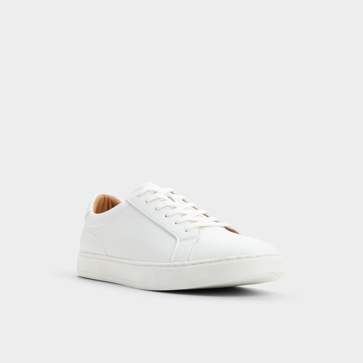 Three-quarter angle of White Fillip Low top sneaker's front side