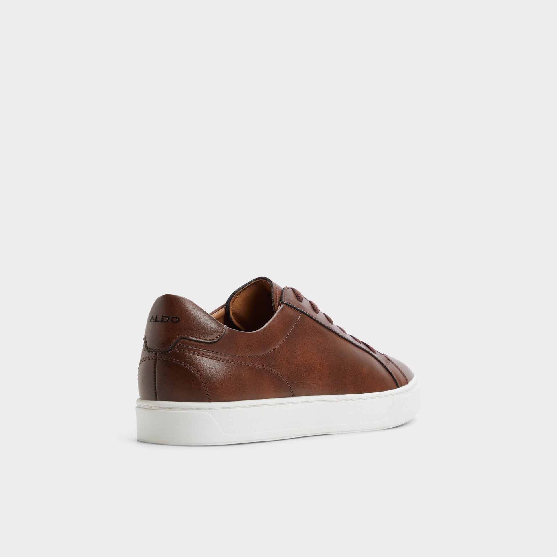Three-quarter angle of Cognac Fillip Low top sneaker's back side