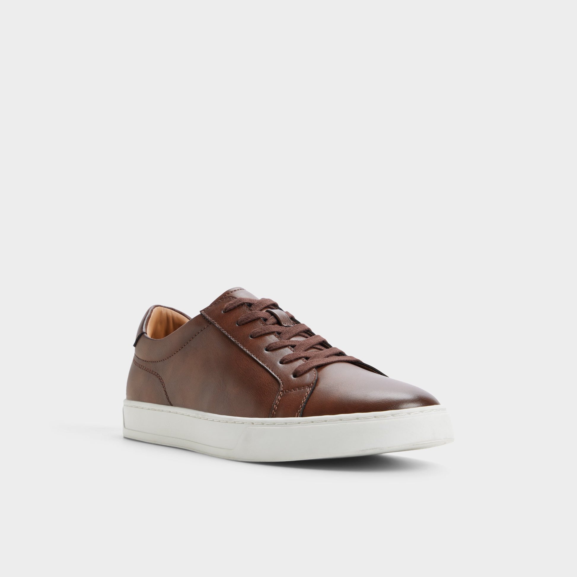 Three-quarter angle of Cognac Fillip Low top sneaker's front side