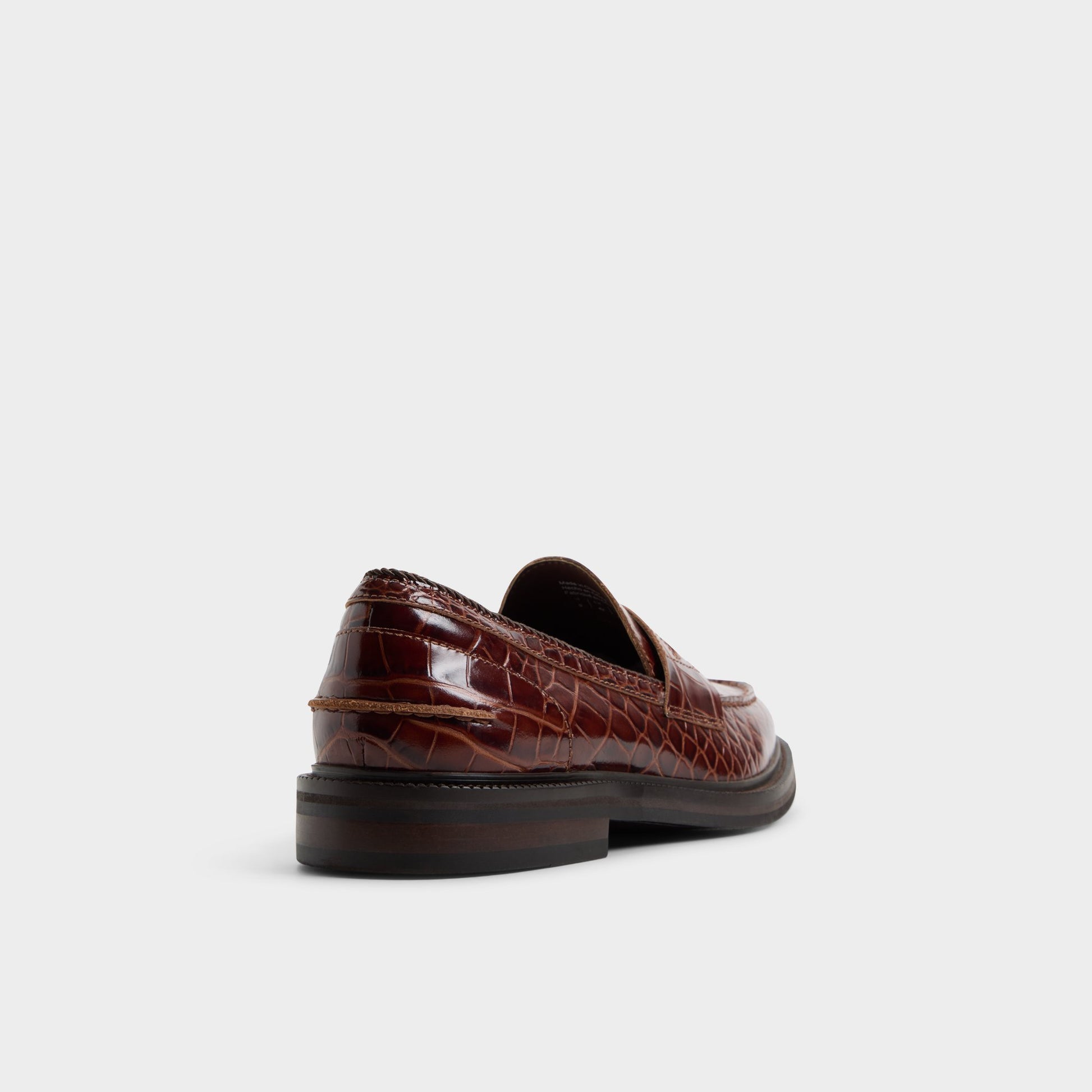 Three-quarter angle of Brown Ruffus Loafer's back side