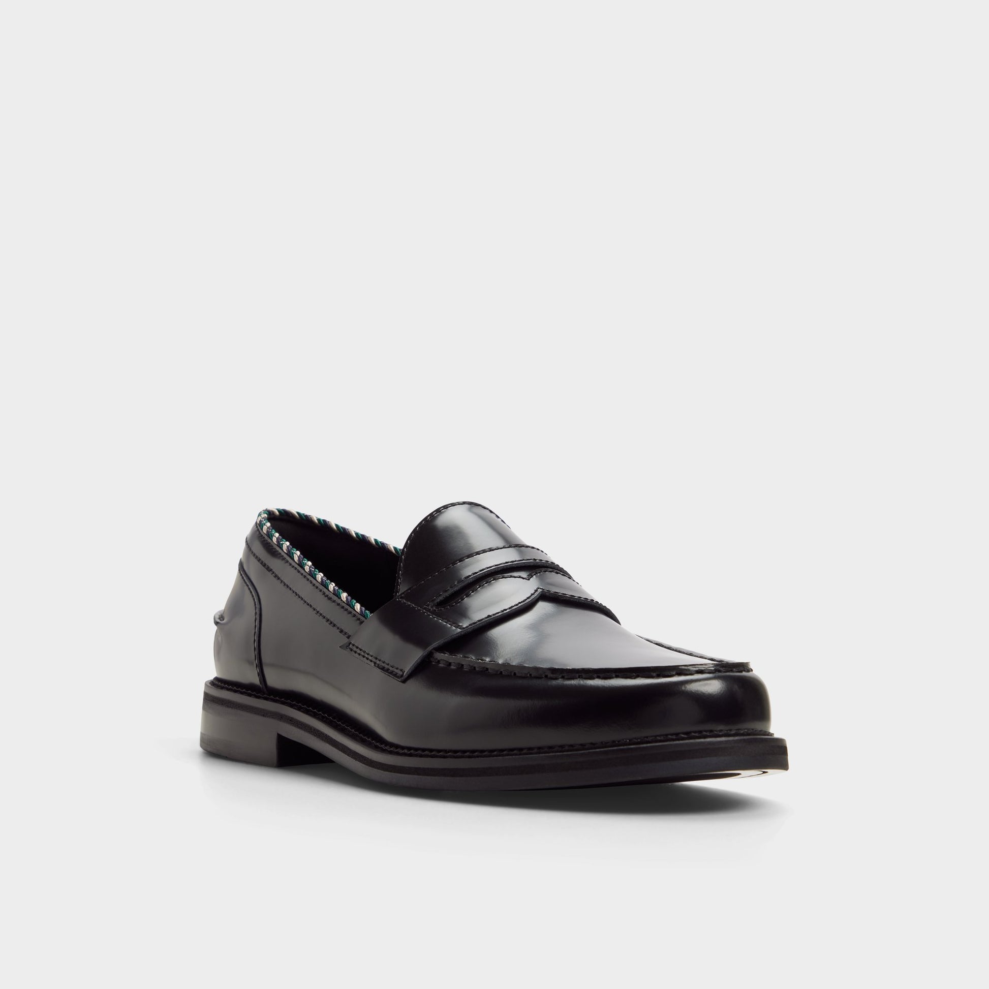 Three-quarter angle of Black Ruffus Loafer's front side