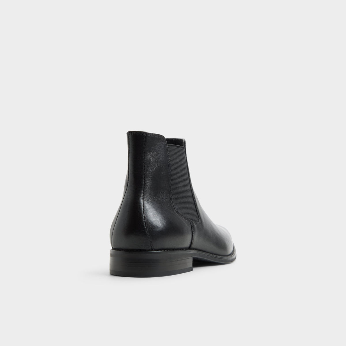 Three-quarter angle of Other black Pietros Chelsea boot's back side