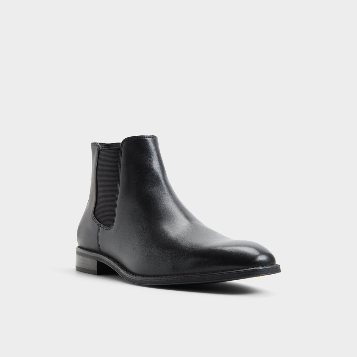 Three-quarter angle of Other black Pietros Chelsea boot's front side