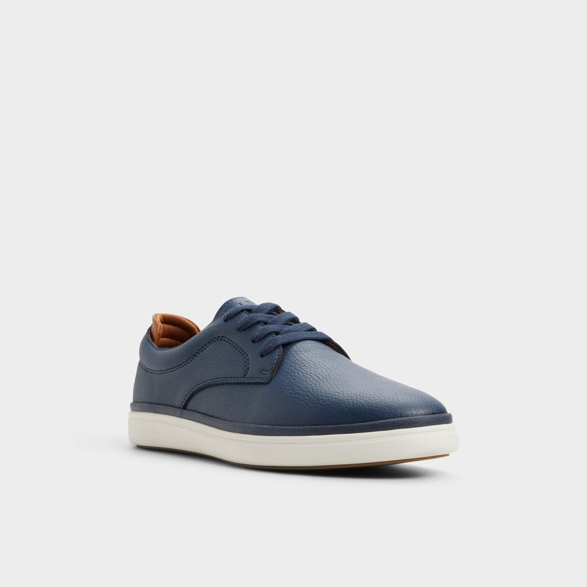 Three-quarter angle of Navy Ted Low top sneaker's front side