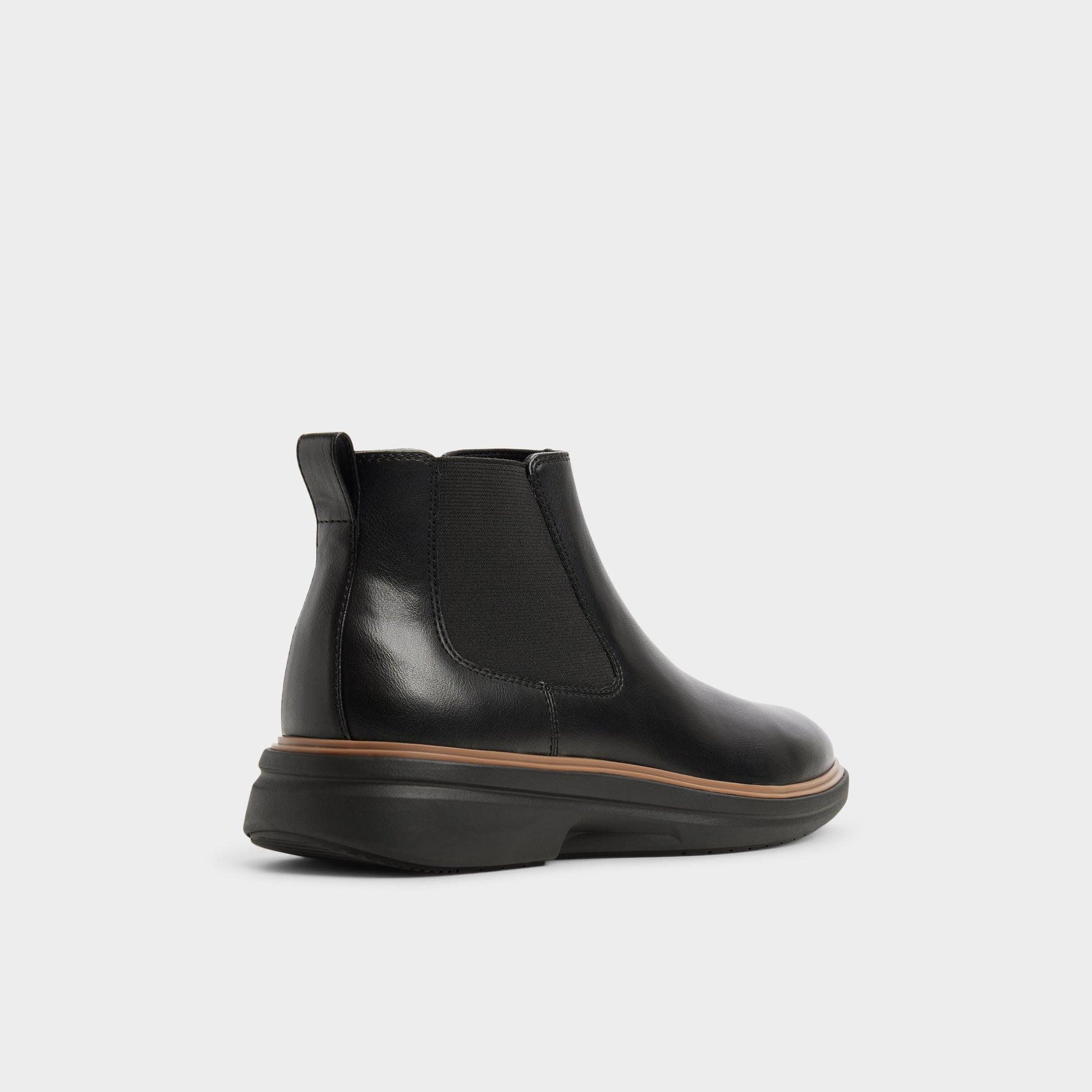 Three-quarter angle of Black Pete Chelsea boot's back side