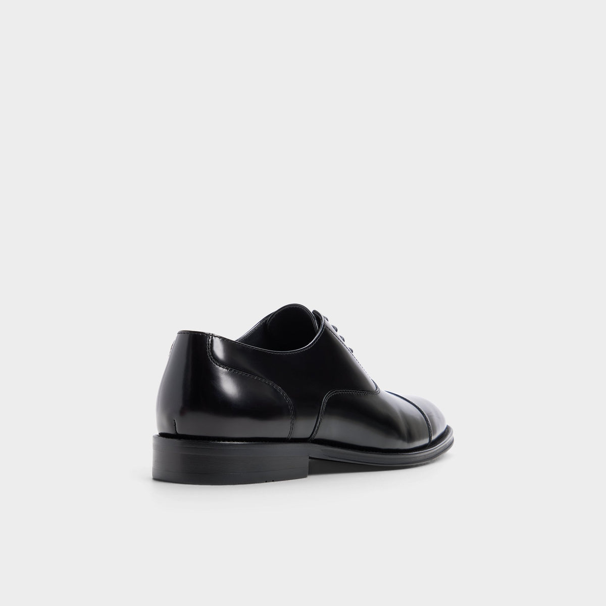 Three-quarter angle of Open black Fez Oxford shoe's back side