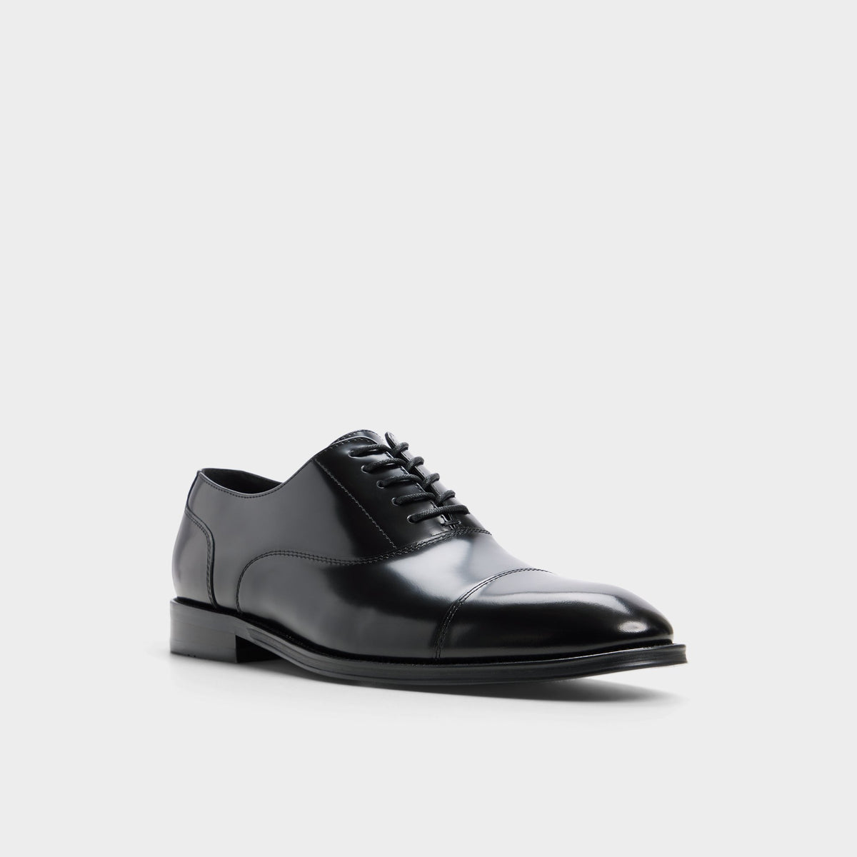 Three-quarter angle of Open black Fez Oxford shoe's front side