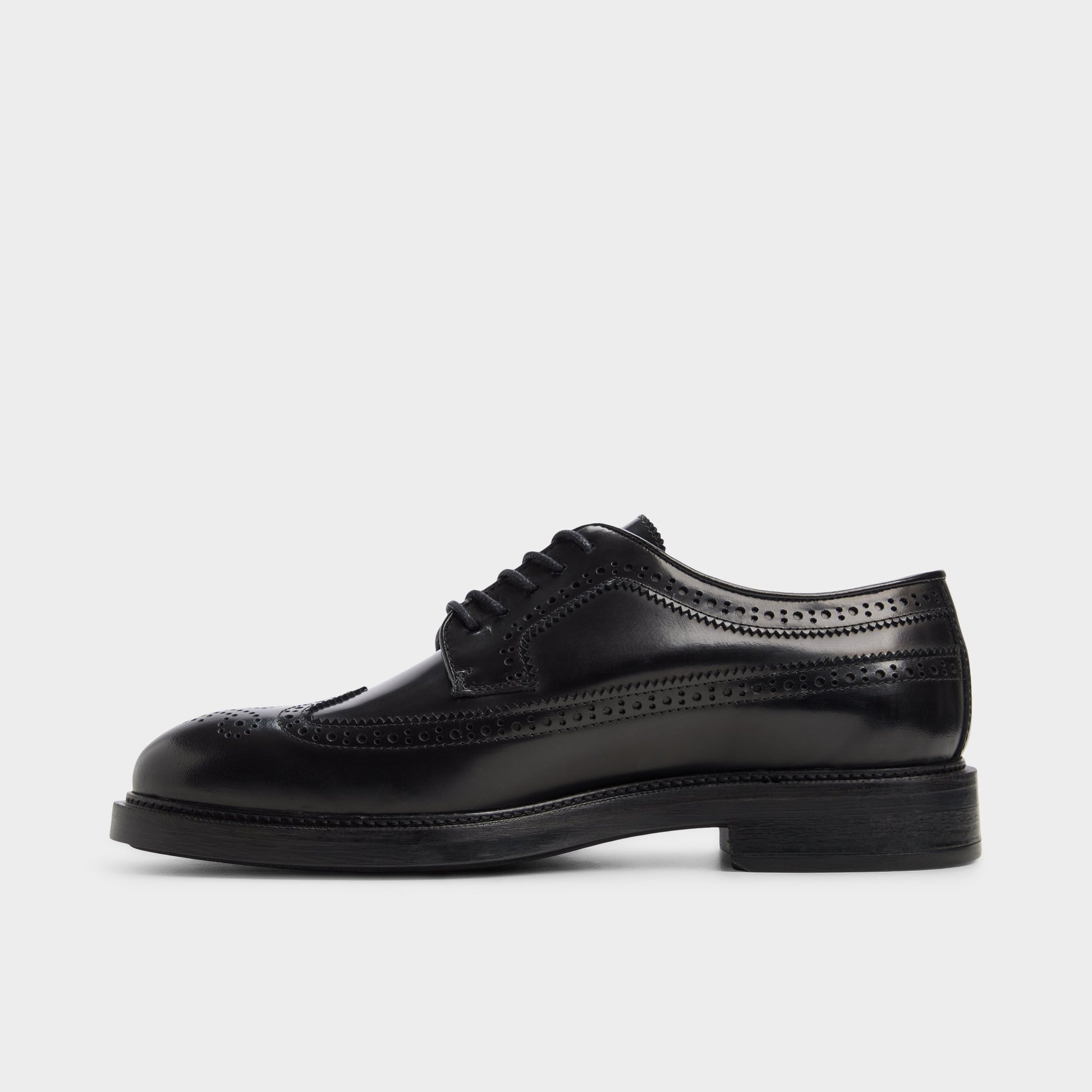Side view of Black Jarvi Brogue lace-up shoe