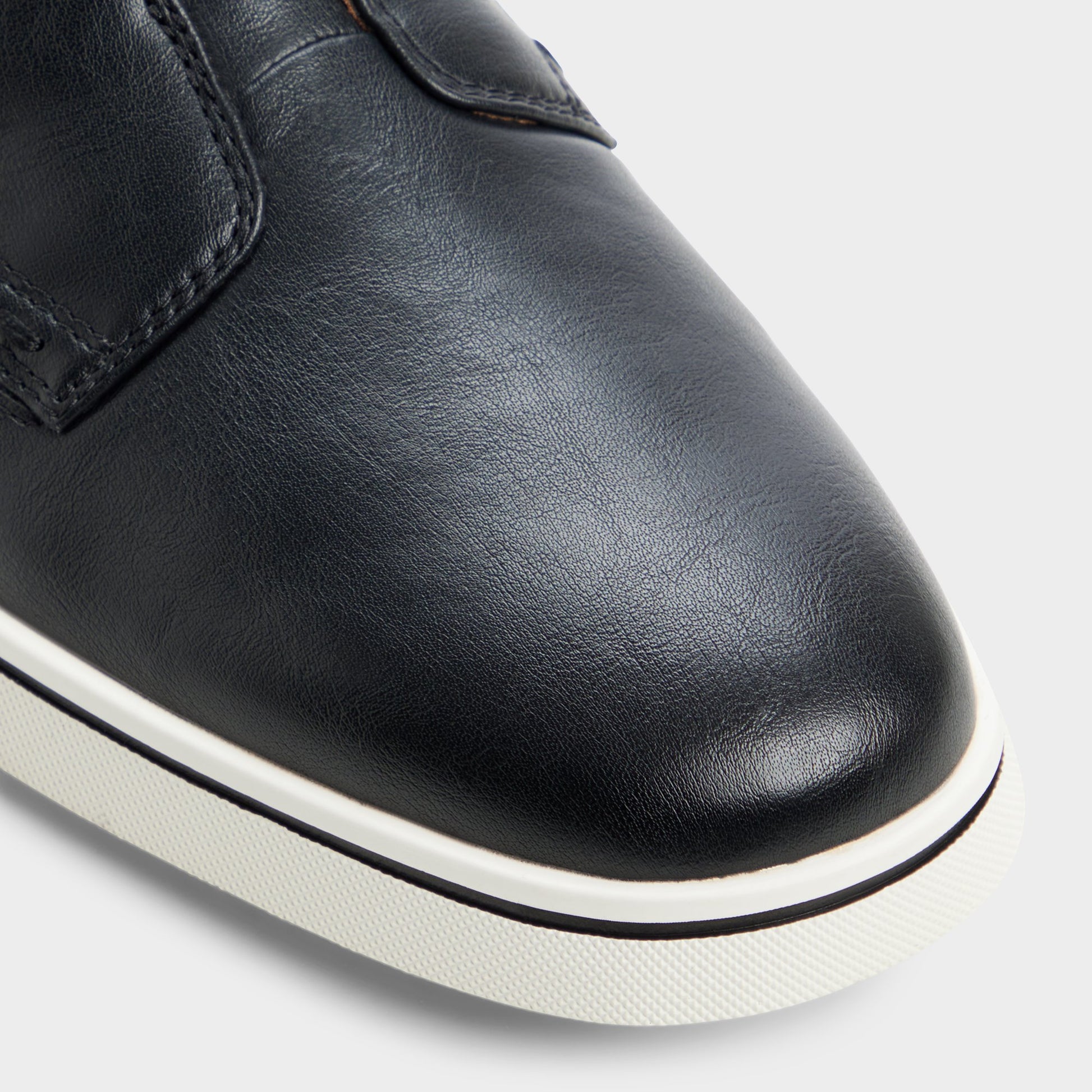 Close-up of the Black Enio Slip-on sneaker