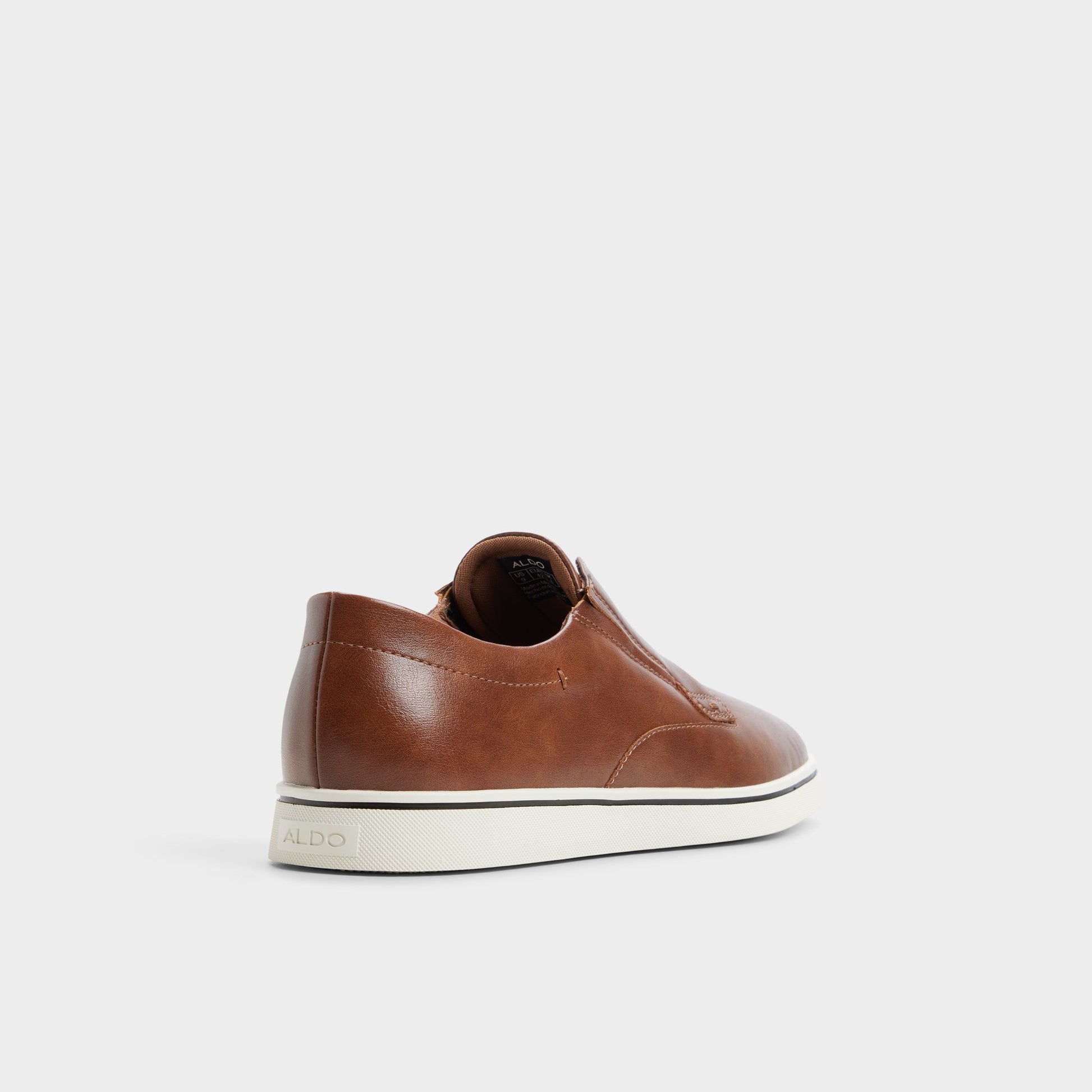 Three-quarter angle of Tan Enio Slip-on sneaker's back side
