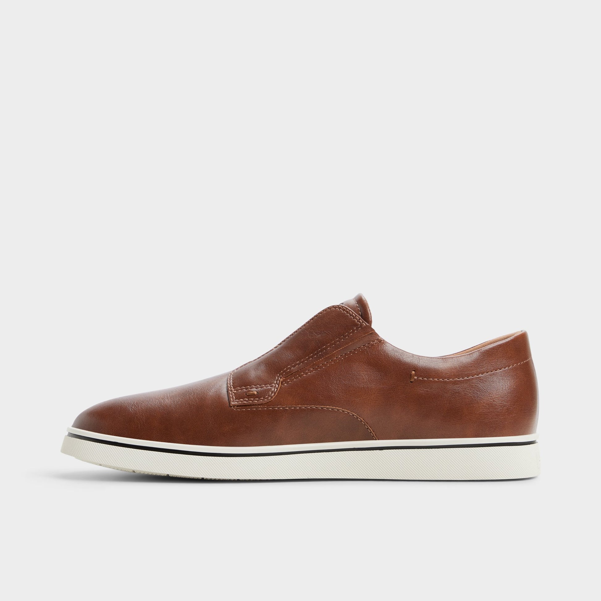 Side view of Tan Enio Slip-on sneaker