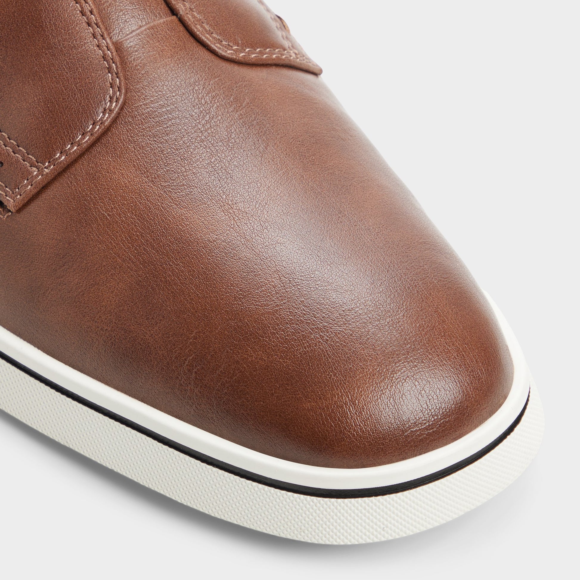 Close-up of the Tan Enio Slip-on sneaker