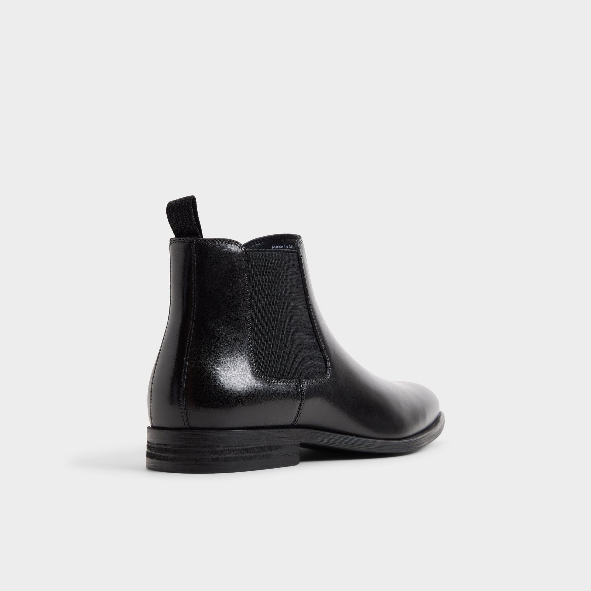 Three-quarter angle of Black Ritchie Chelsea boot's back side
