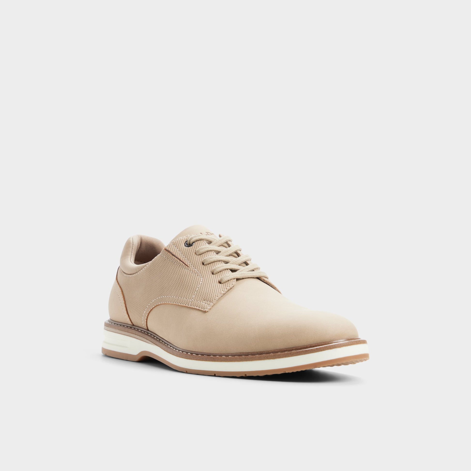Three-quarter angle of Taupe Terrano Oxford shoe's front side