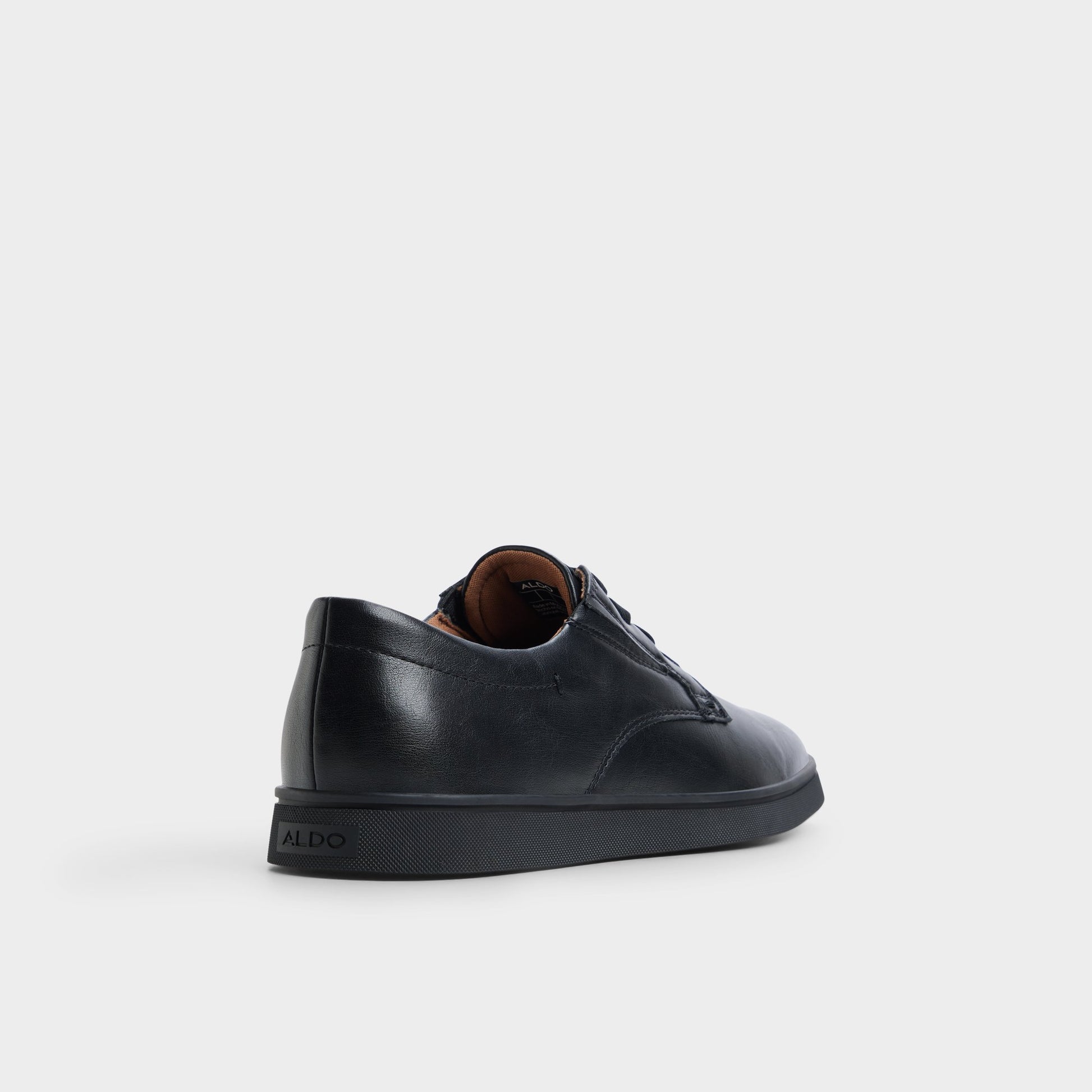 Three-quarter angle of Black/black Dougie Slip-on sneaker's back side