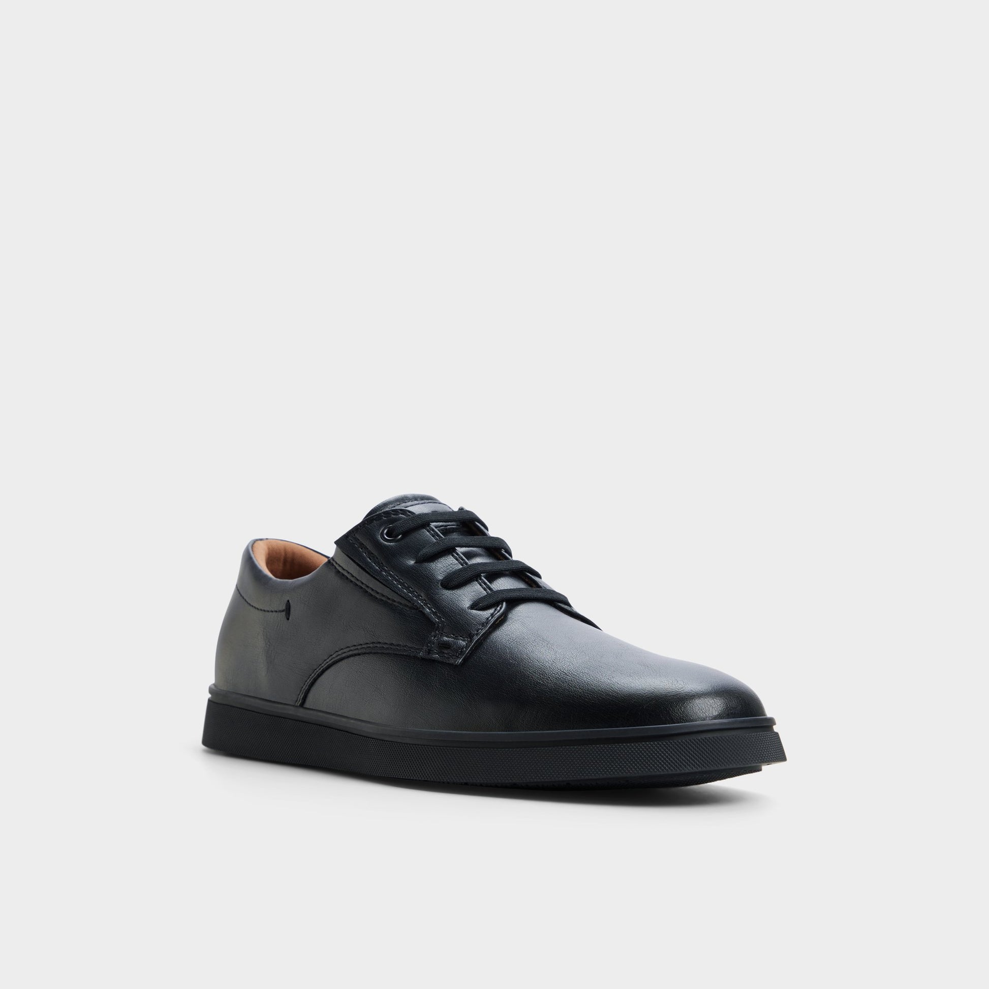 Three-quarter angle of Black/black Dougie Slip-on sneaker's front side