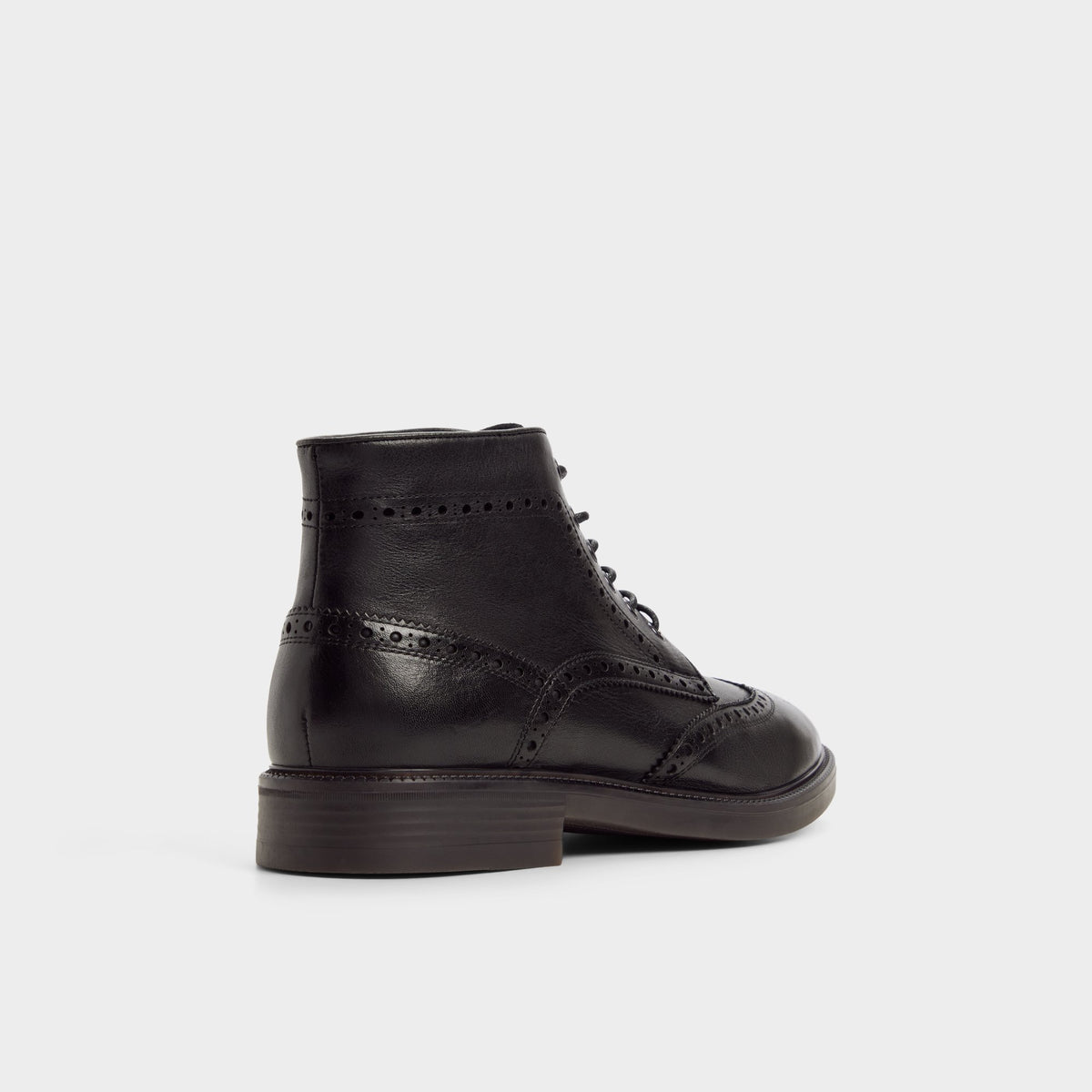 Three-quarter angle of Black Colombo Brogue ankle boot's back side