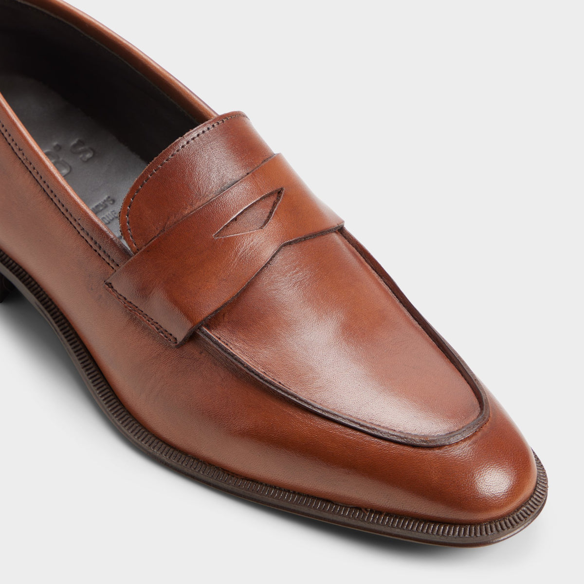 Three-quarter angle of Tan Davio Loafer's front side