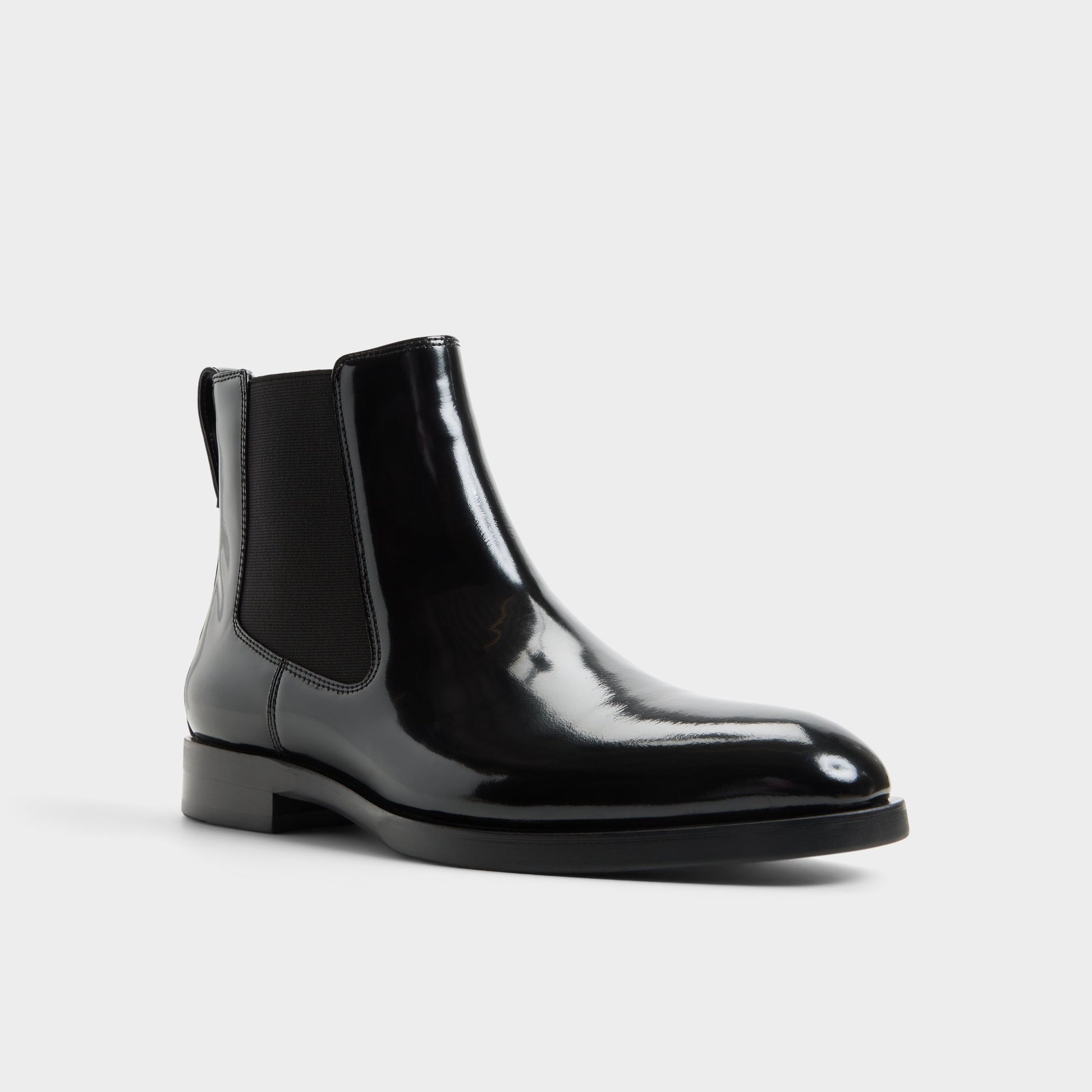 Three-quarter angle of Black Nik Chelsea boot's front side