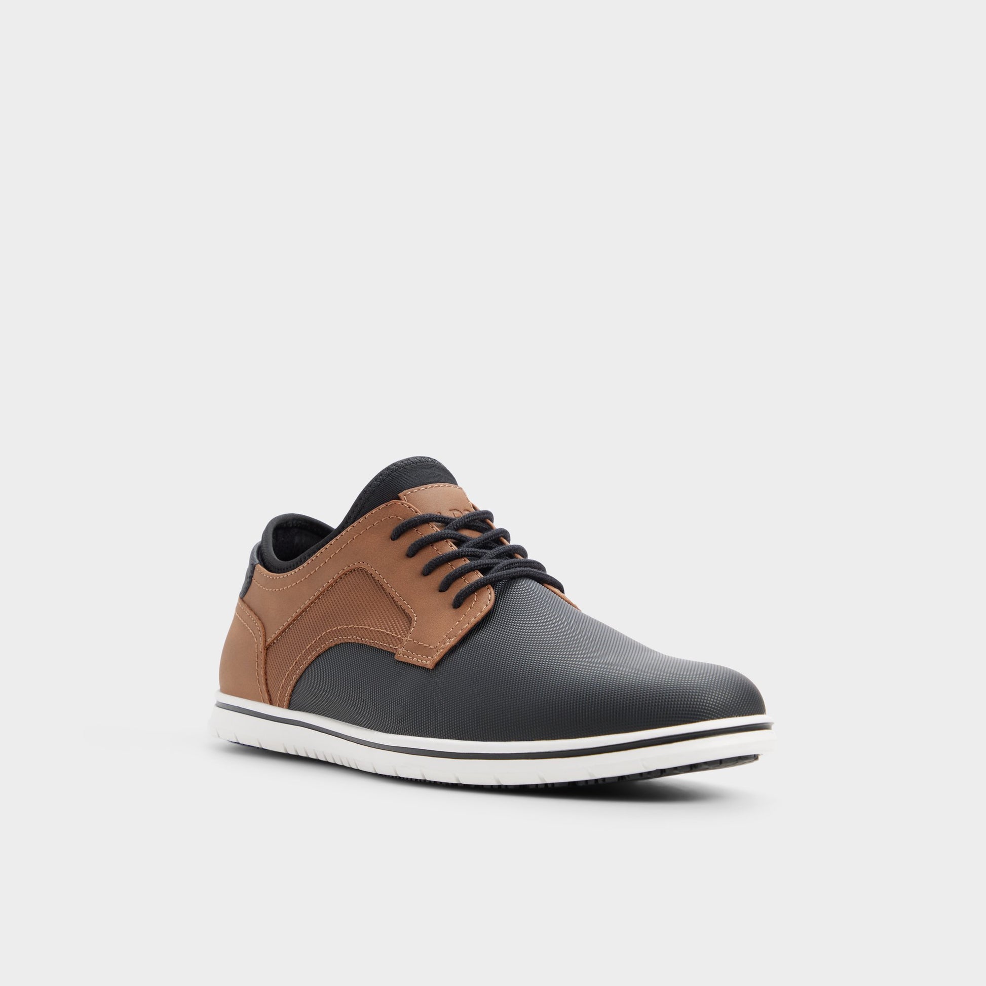 Three-quarter angle of Tan multi Drymos Oxford shoe's front side