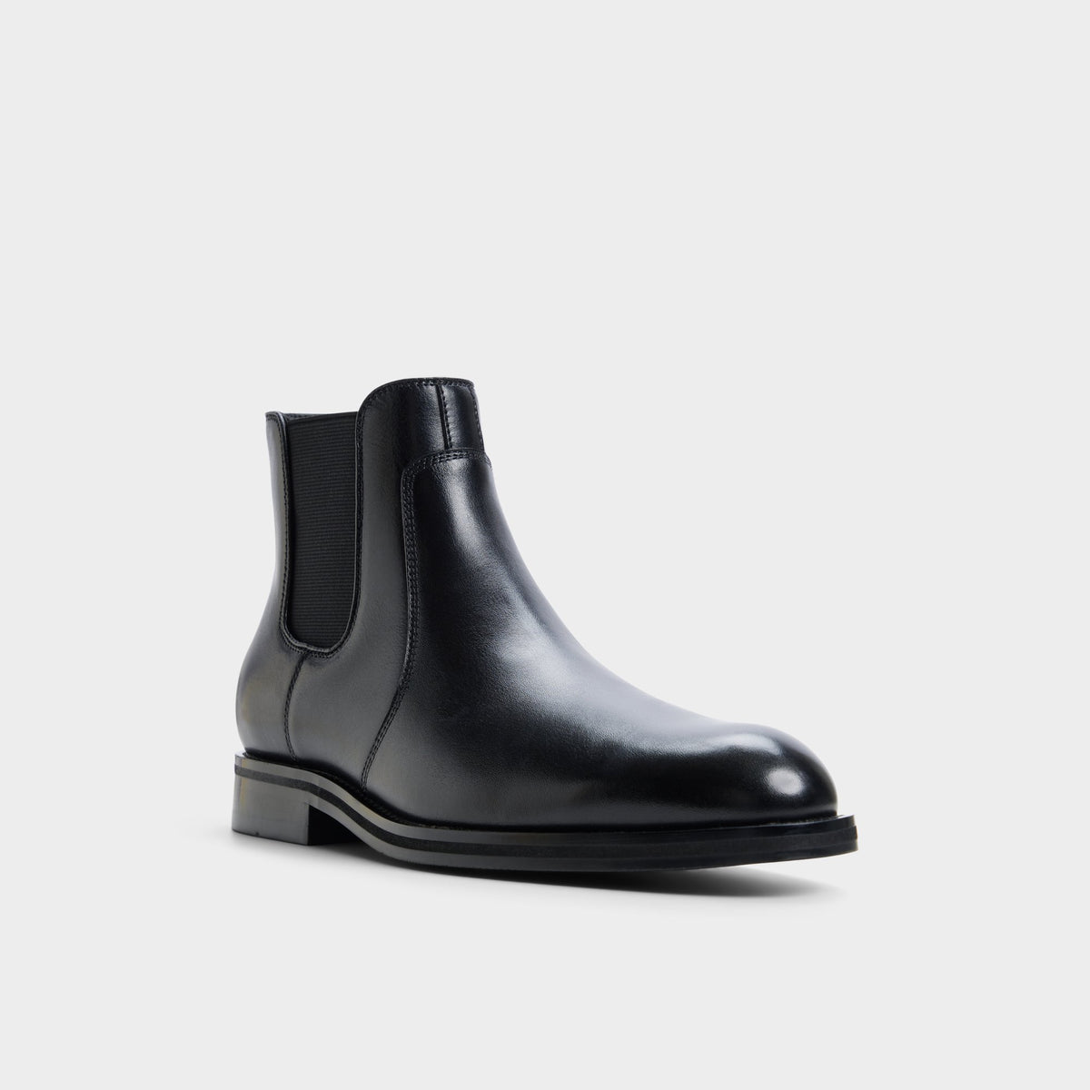 Three-quarter angle of Black Bartell Chelsea boot's front side
