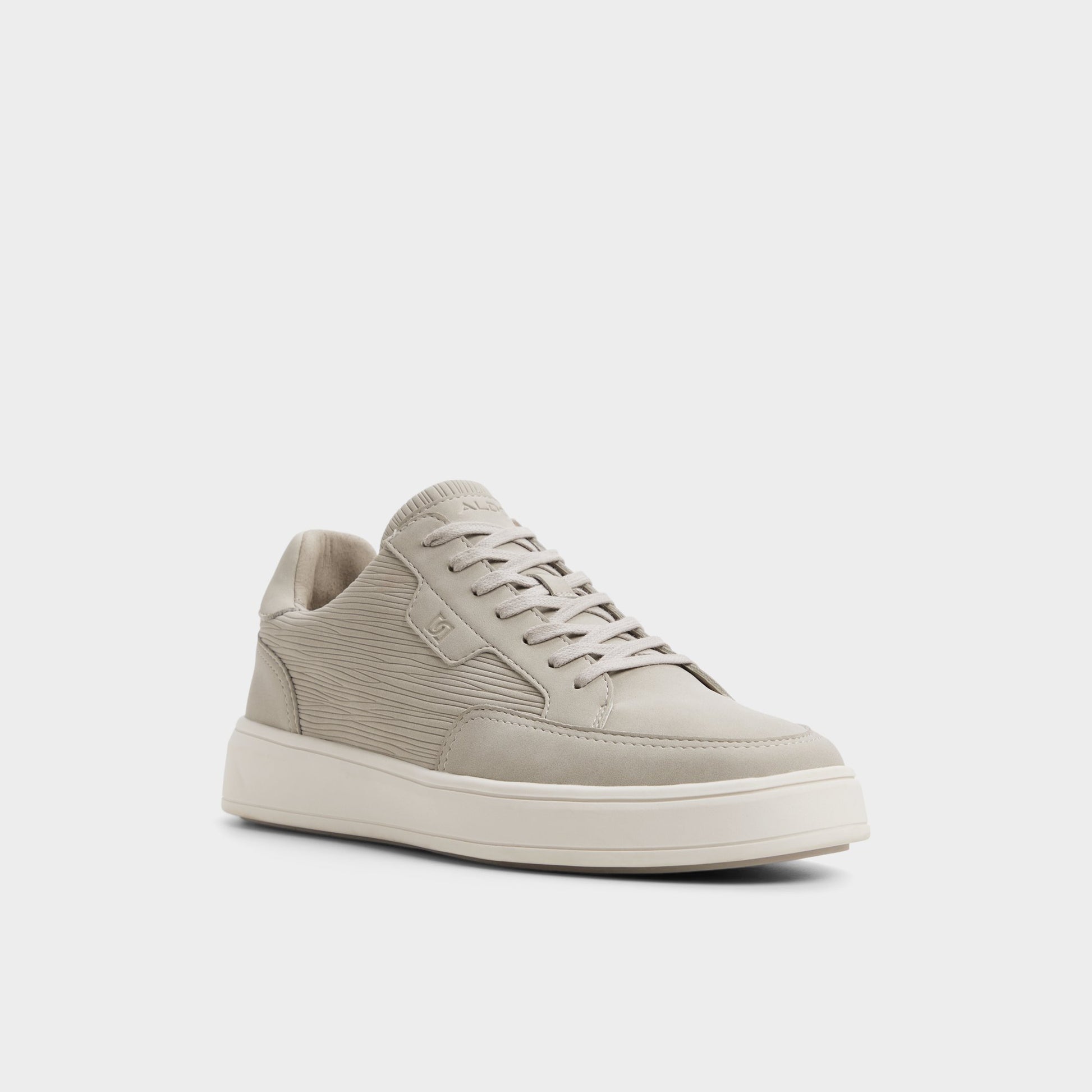 Three-quarter angle of Light grey Miko Low top sneaker's front side