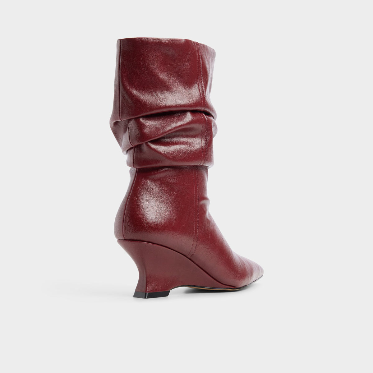 Three-quarter angle of Dark red Calain Wedge heel mid-calf boot's back side
