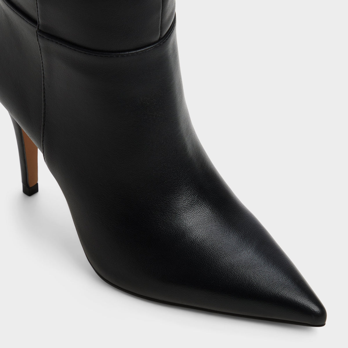 Three-quarter angle of Black Hillsdon Stiletto heel over-the-knee boot's front side
